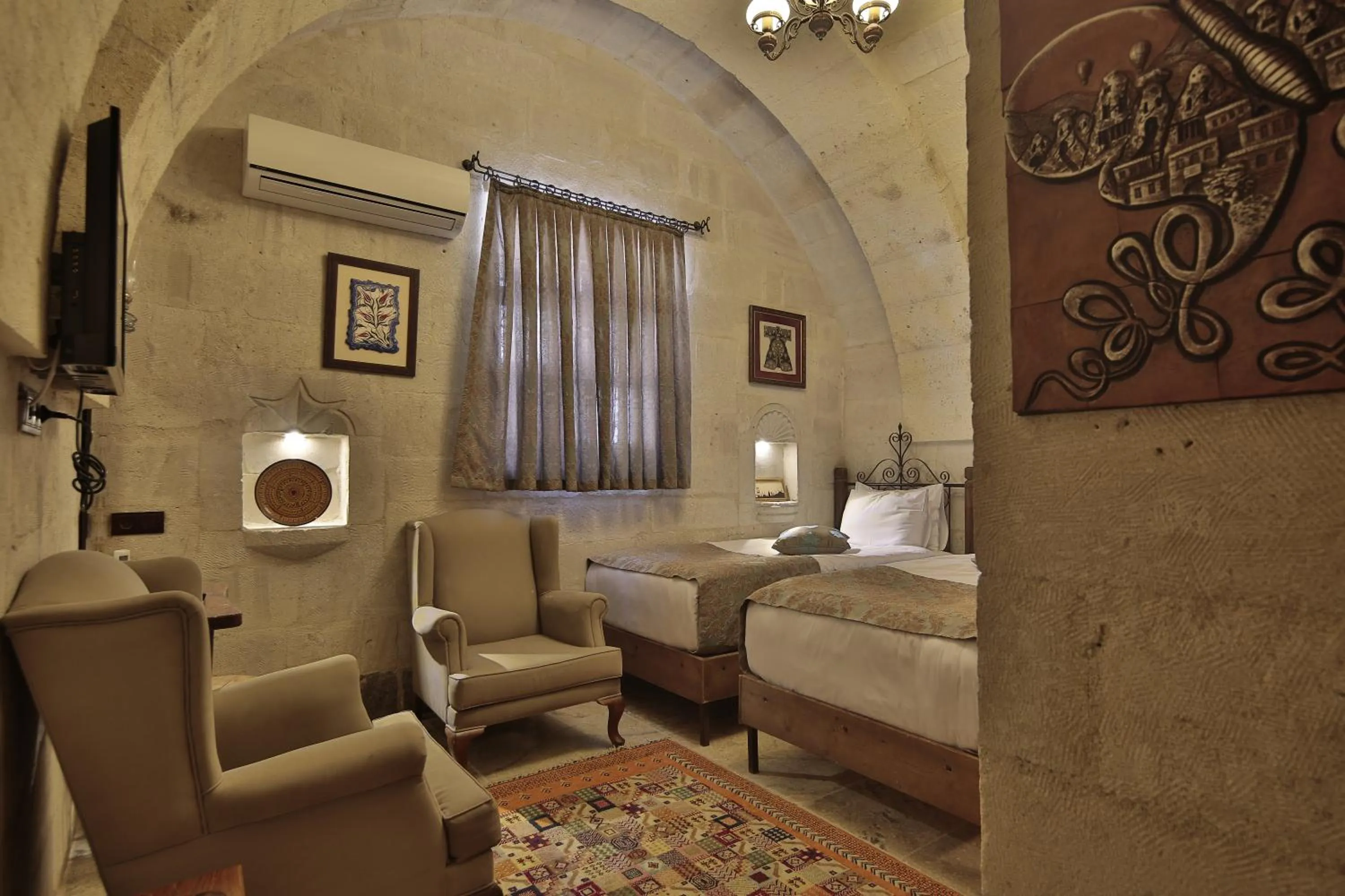 Bed in Aren Cave Hotel And Art Gallery