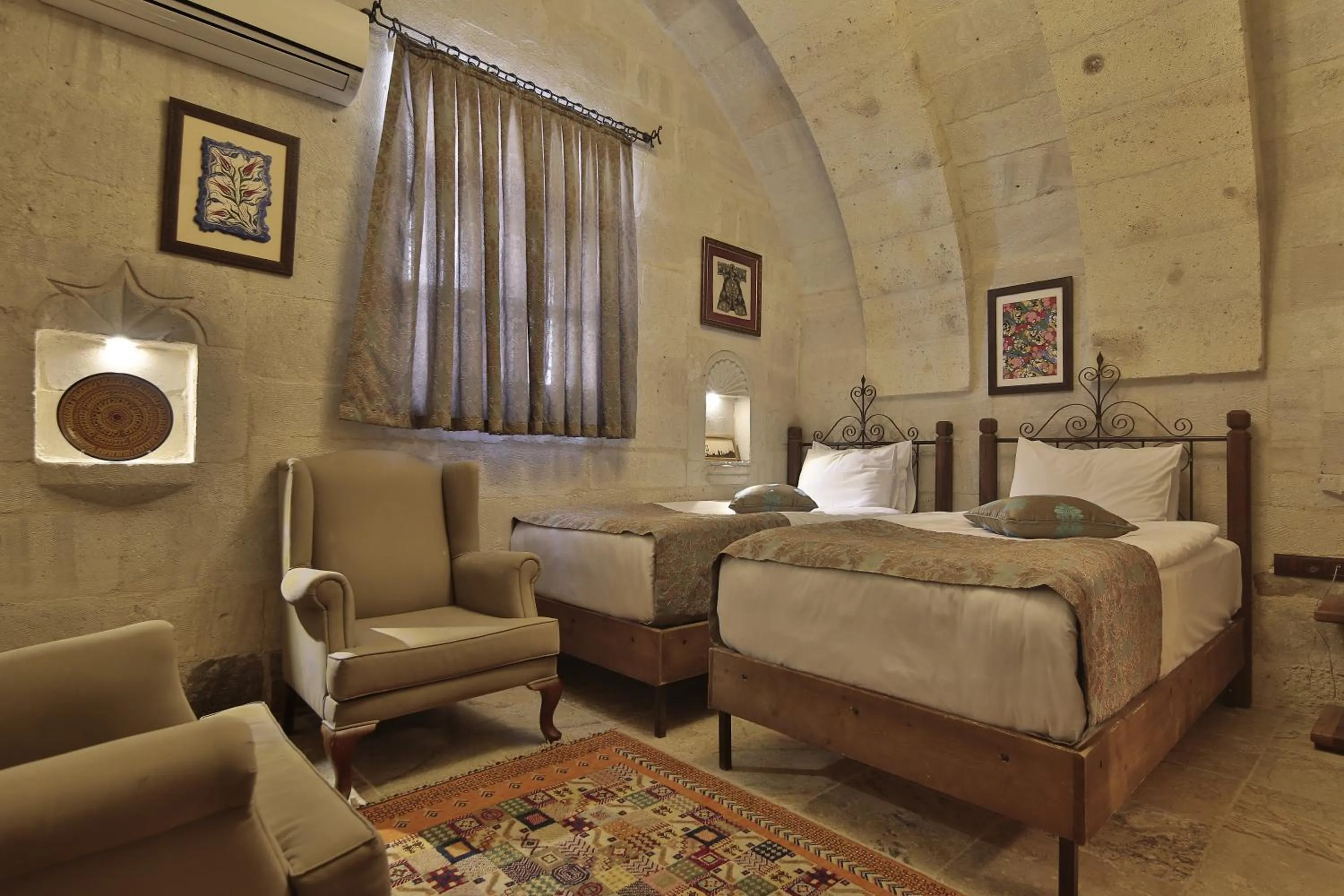 Bed in Aren Cave Hotel And Art Gallery