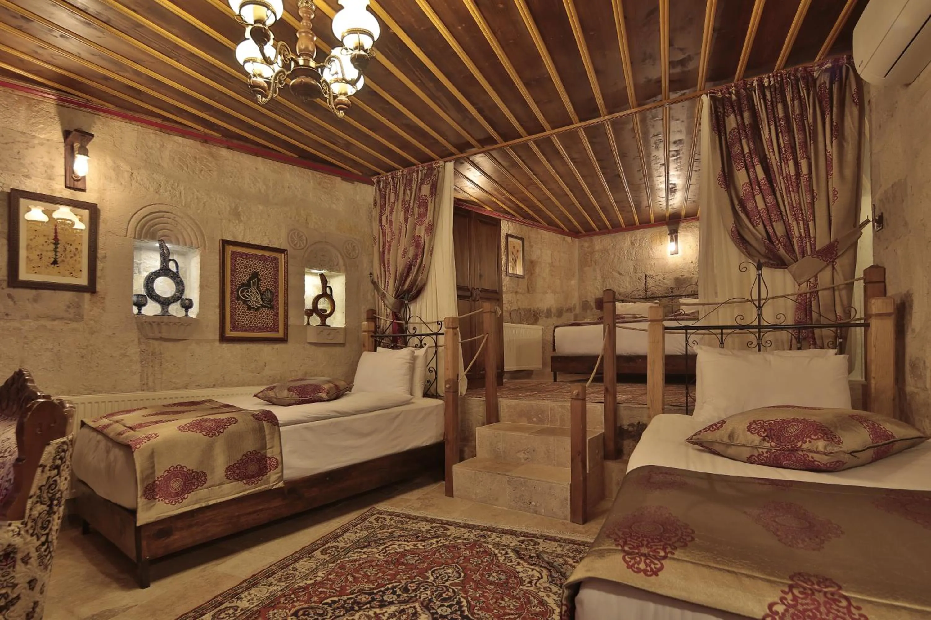 Bed in Aren Cave Hotel And Art Gallery