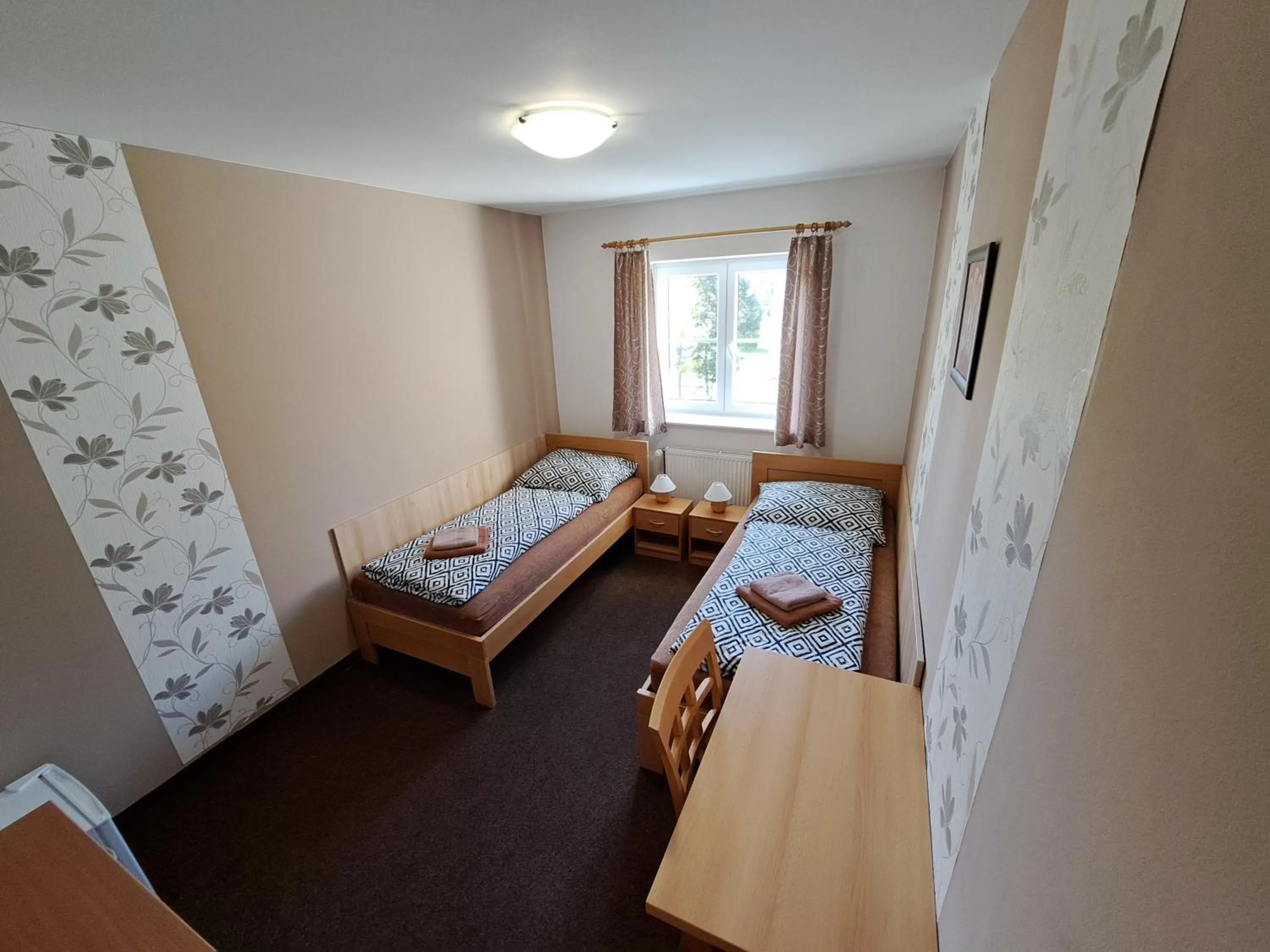 Photo of the whole room, Bed in Vzdělávací Středisko a Hotel