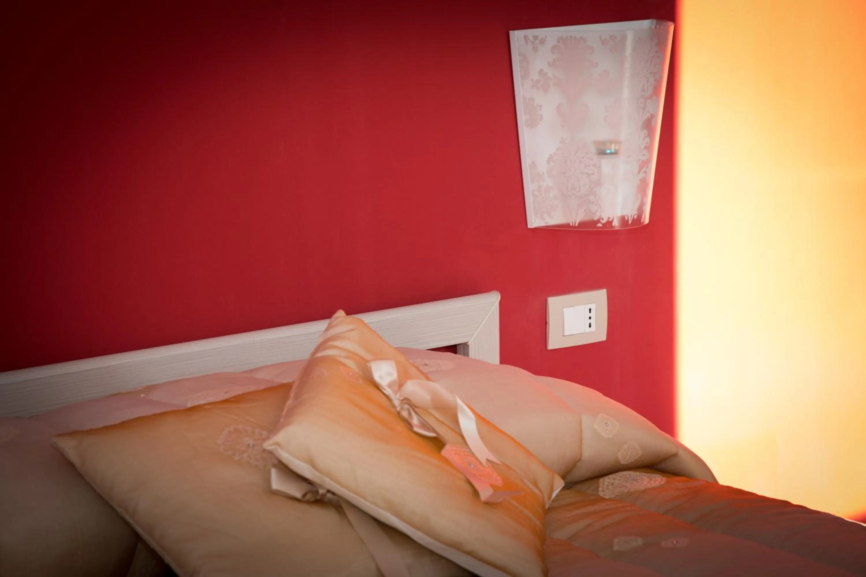 Bed in Modica Garden Resort