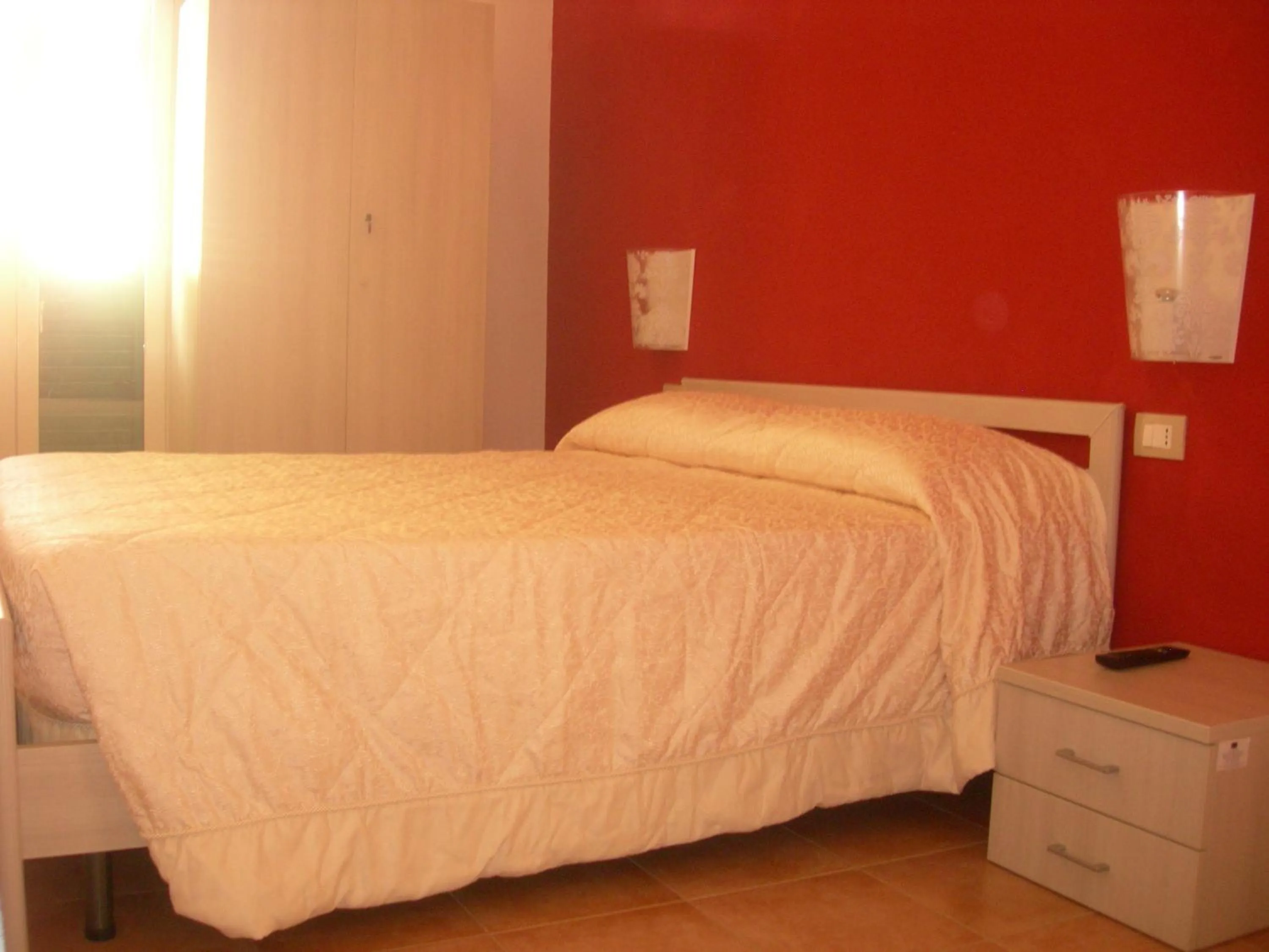 Bed in Modica Garden Resort