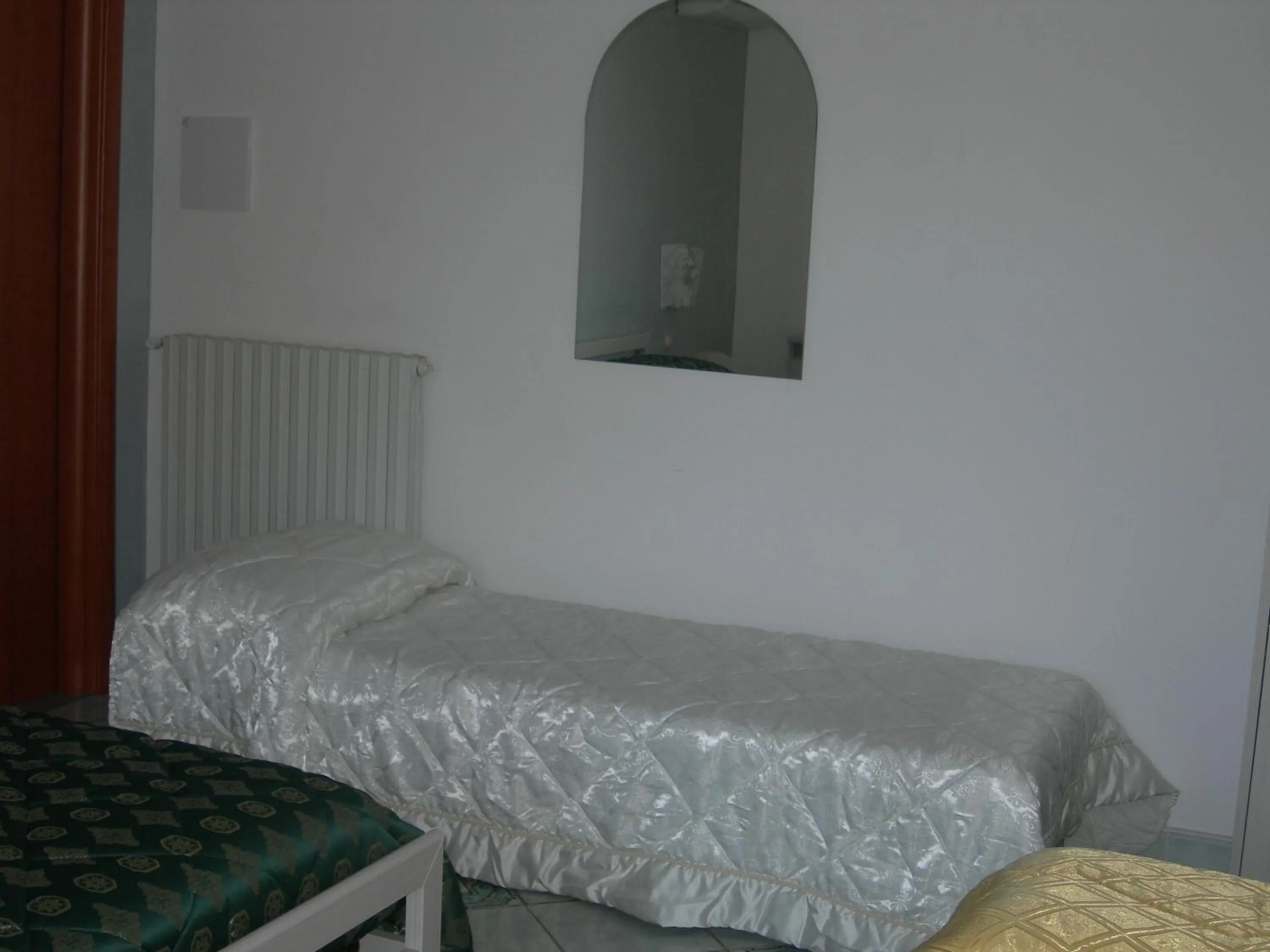 Bed in Modica Garden Resort
