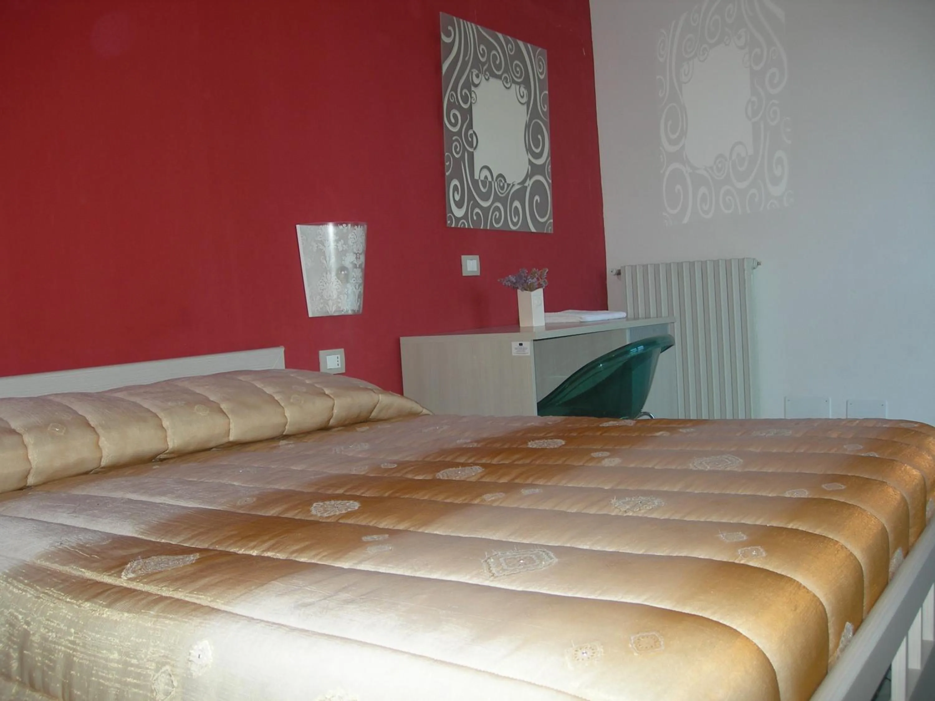 Bed in Modica Garden Resort