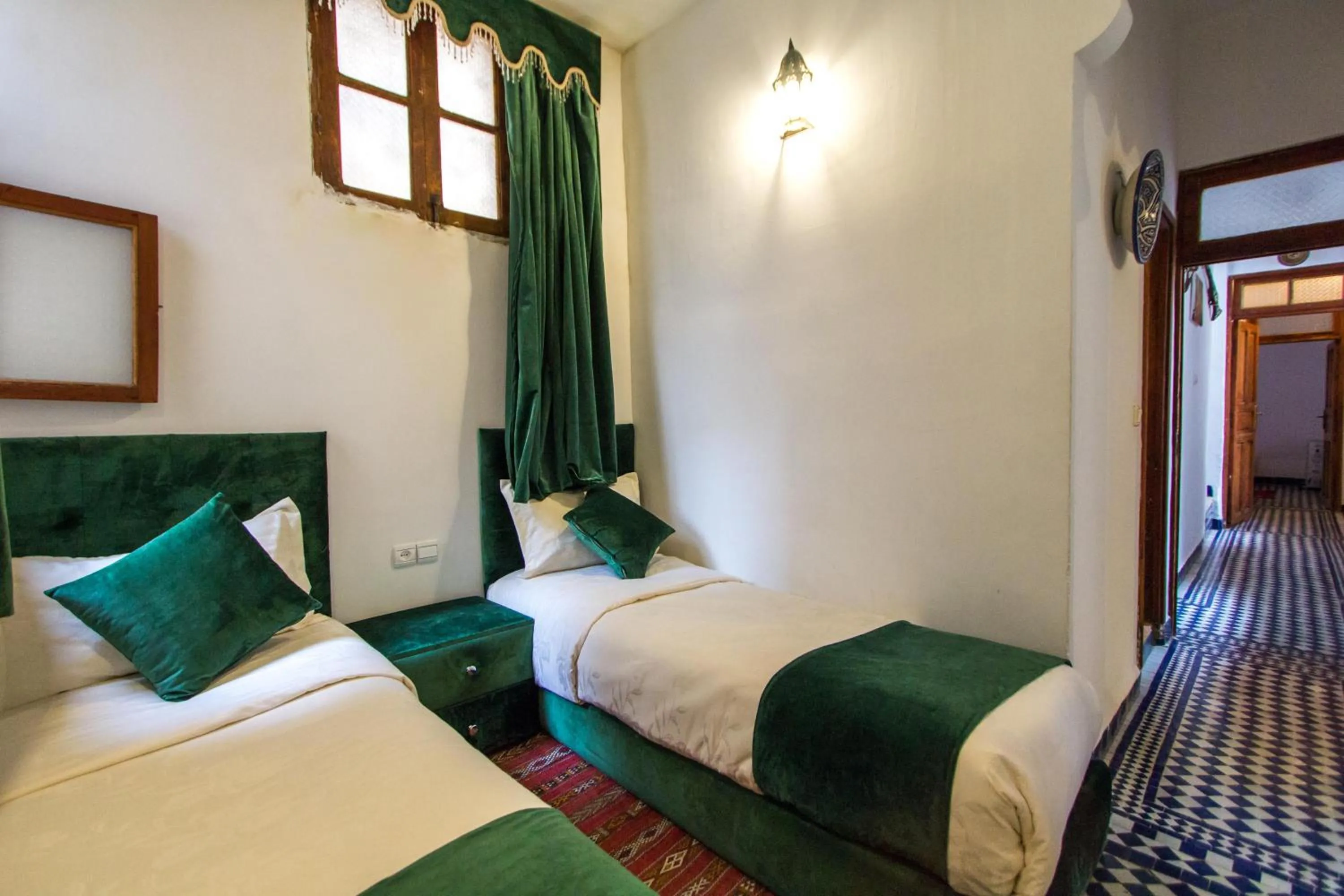 Bed in Riad Dar Bab Guissa