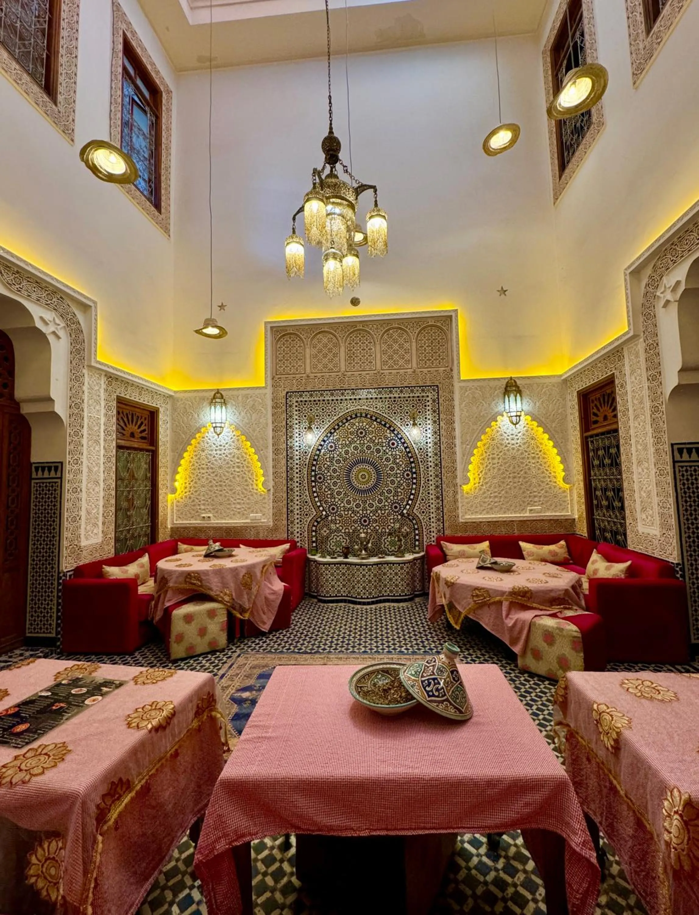 Living room, Bed in Riad Dar Bab Guissa