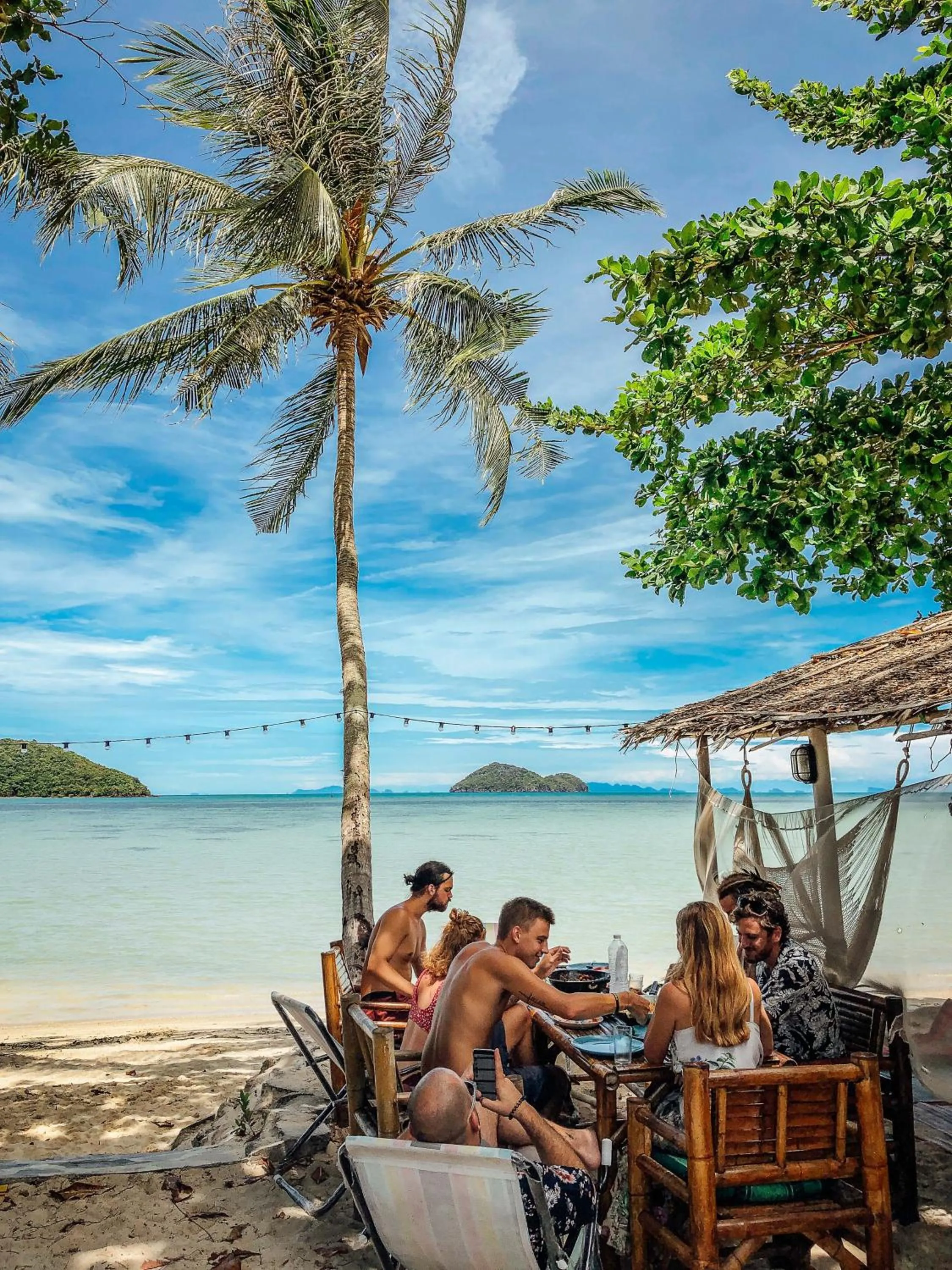 People in Colorful Hut