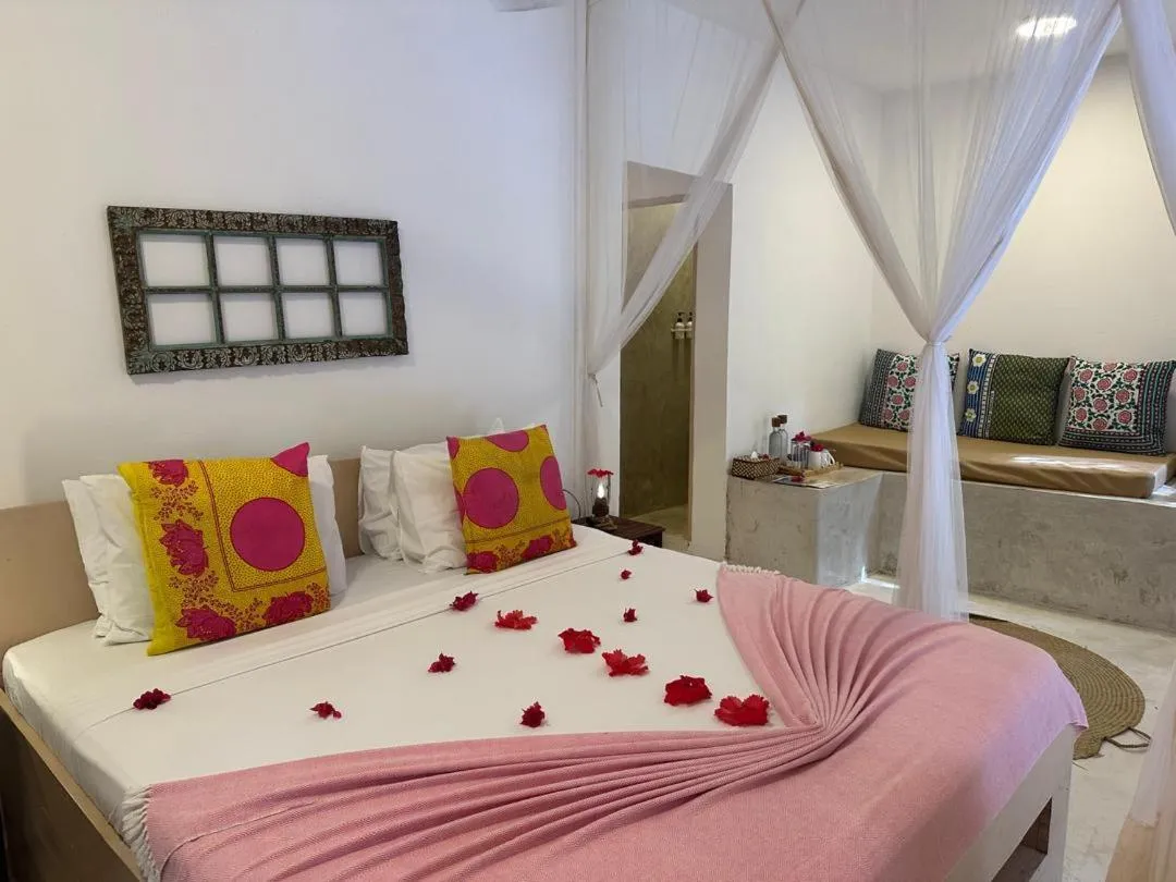 Bed in Sharazad Boutique Hotel