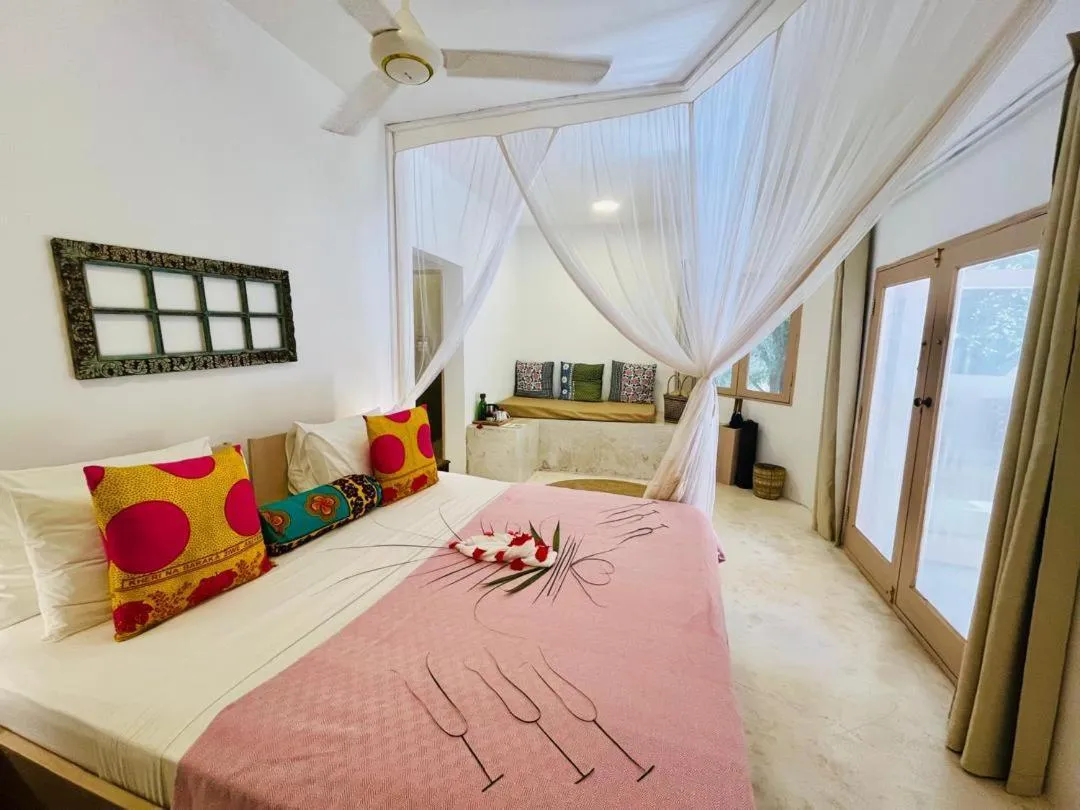 Bed in Sharazad Boutique Hotel