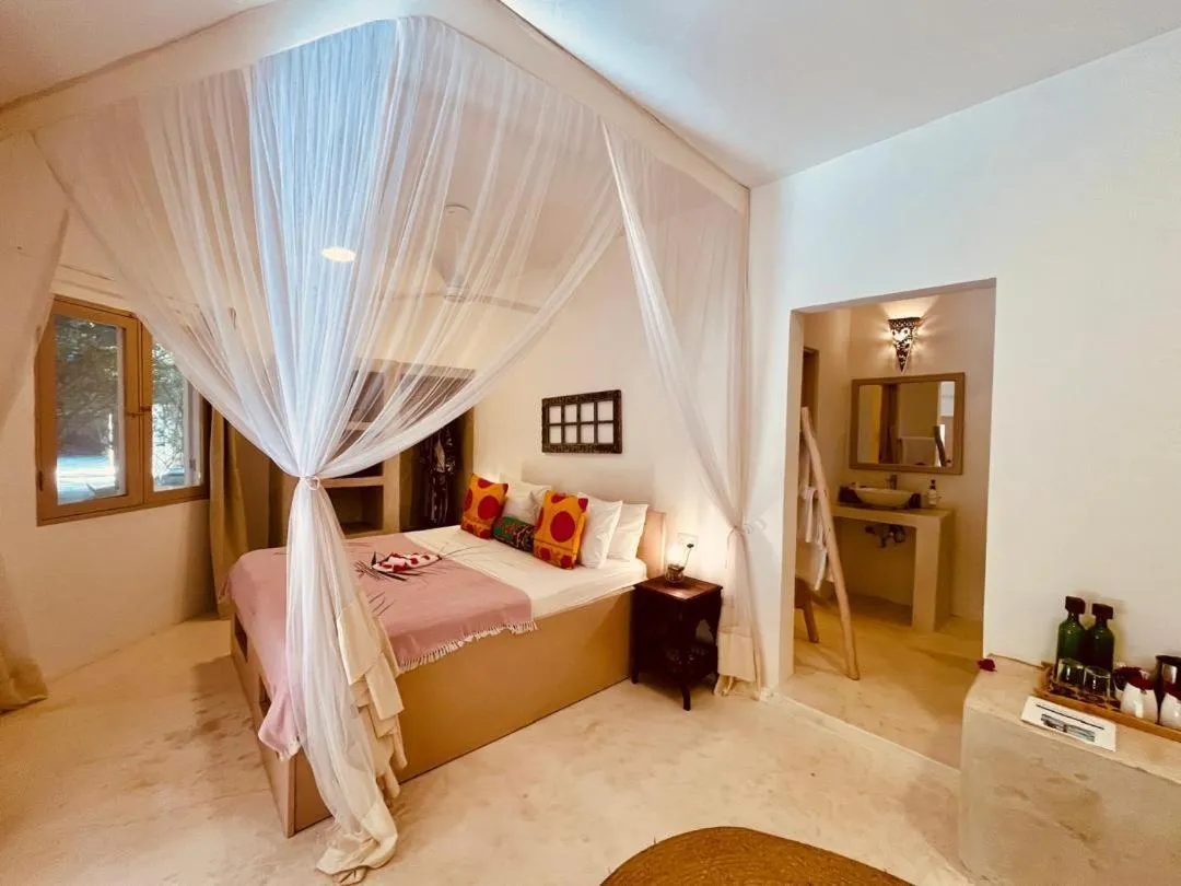 Bed in Sharazad Boutique Hotel