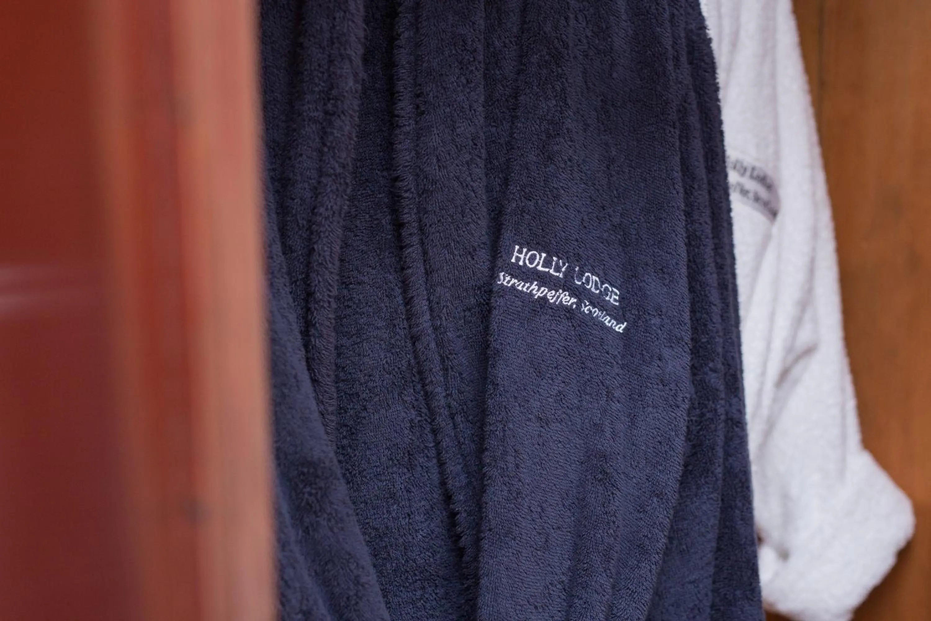 Property logo or sign in Holly Lodge