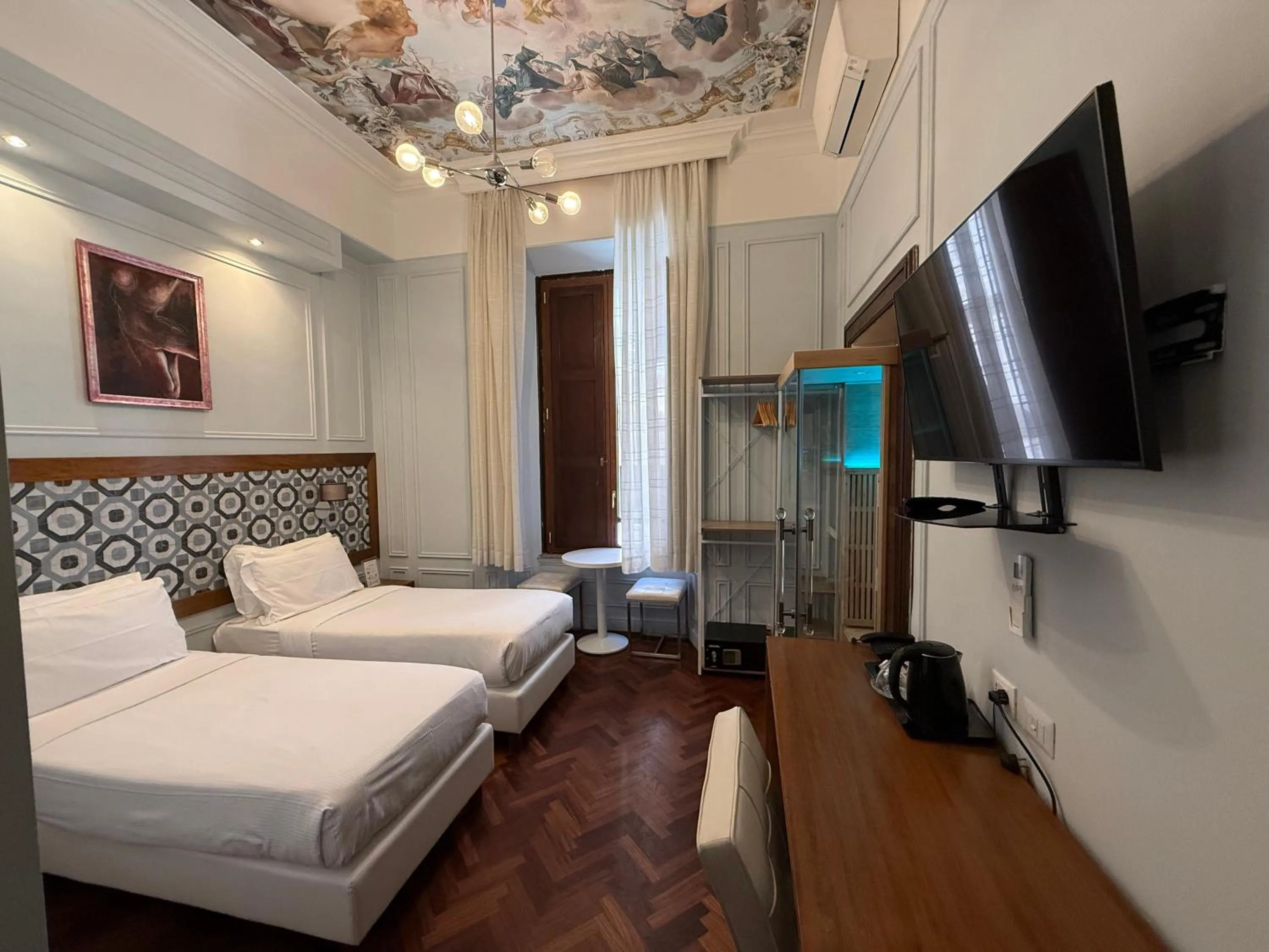 Bed in Navona Central Suites