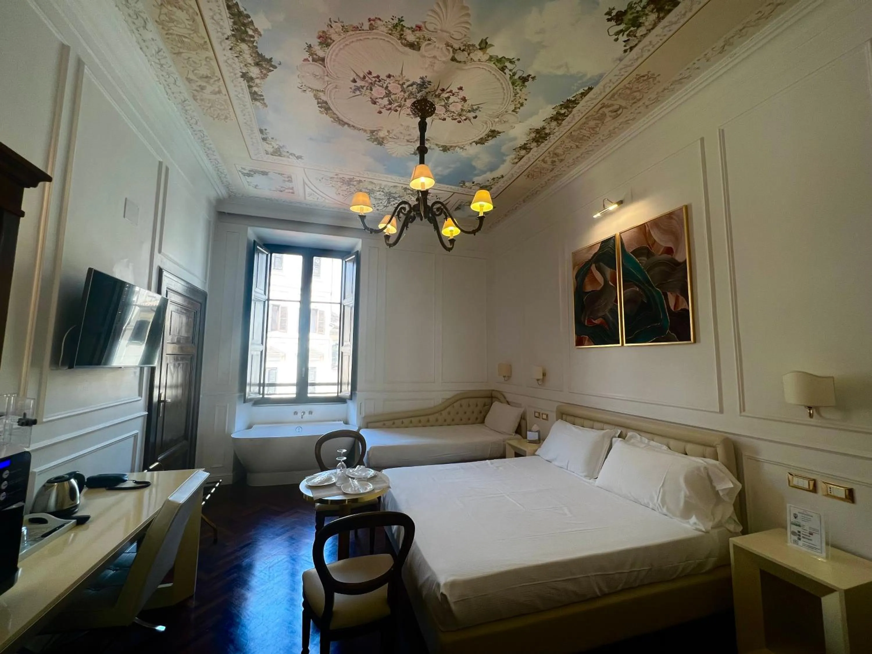 Photo of the whole room, Bed in Navona Central Suites