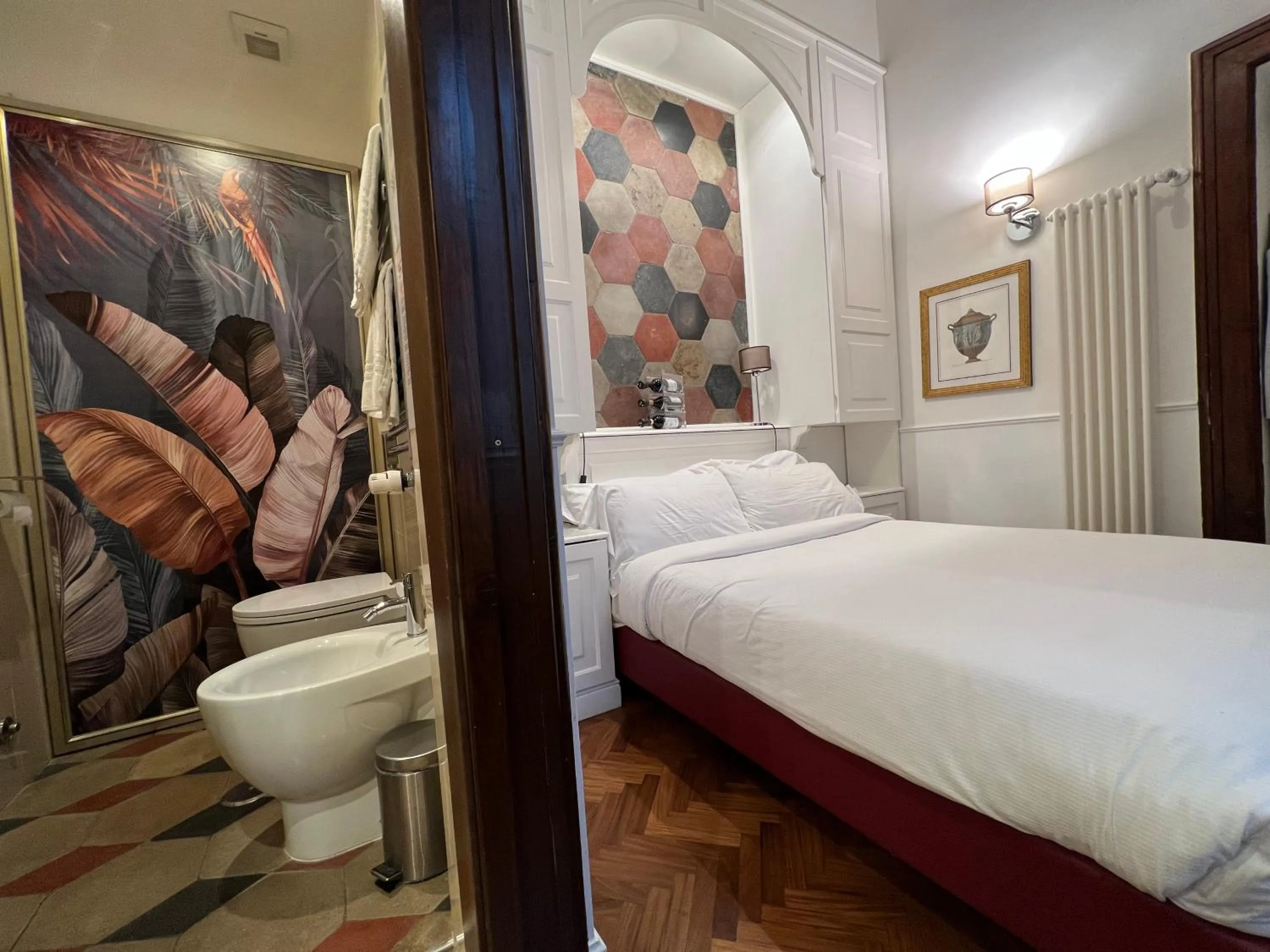 Photo of the whole room, Bed in Navona Central Suites