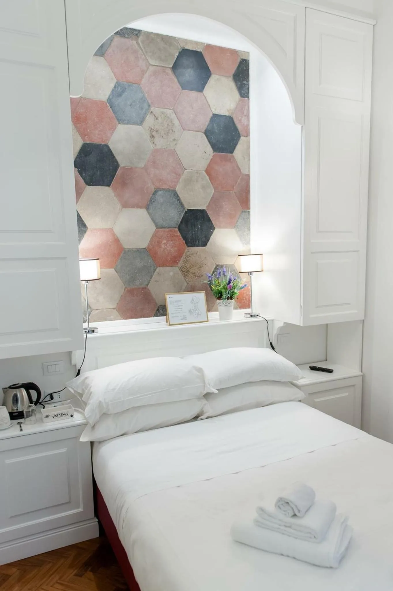 Bed in Navona Central Suites