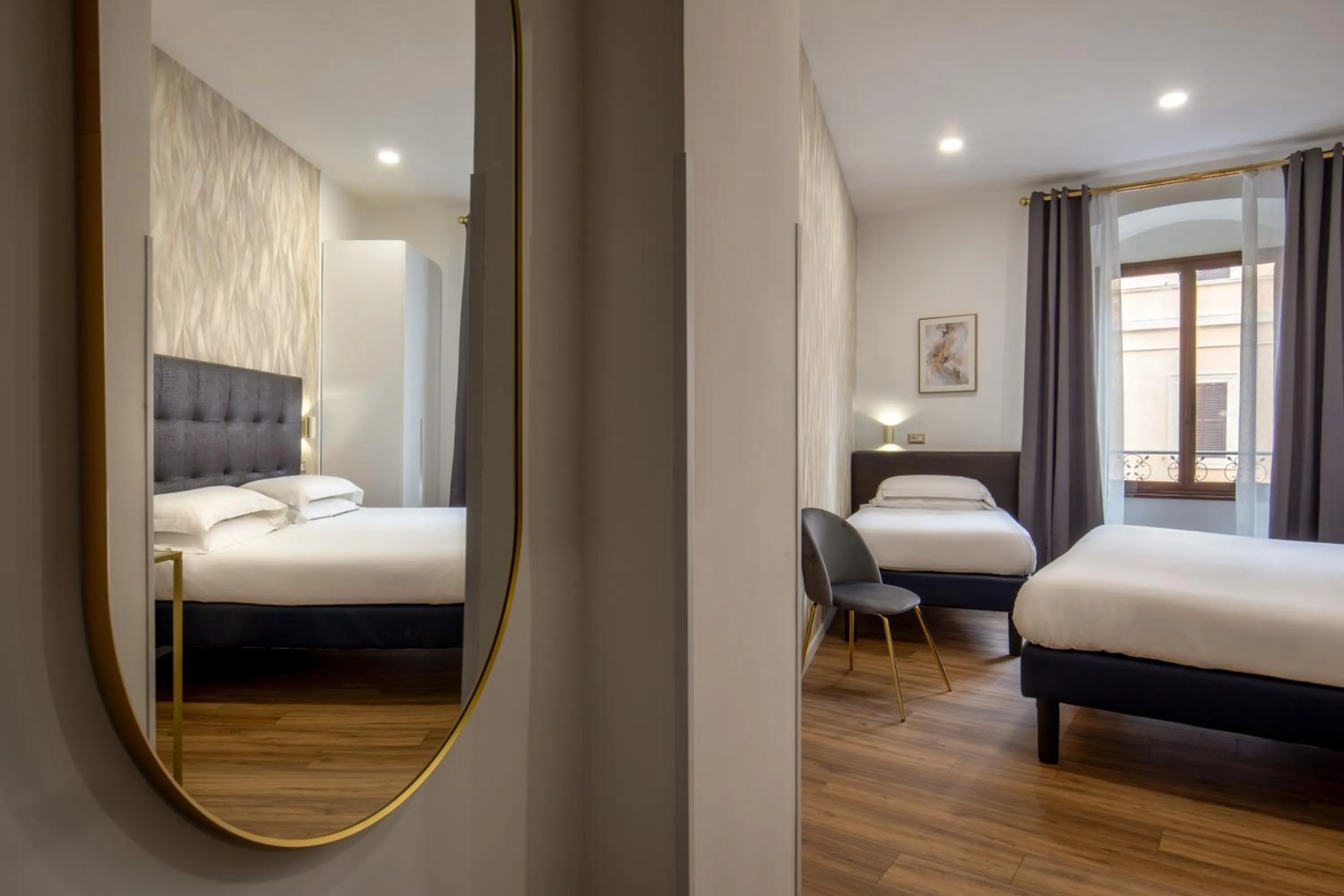 Bed in Amalia Suites by Remember Rome