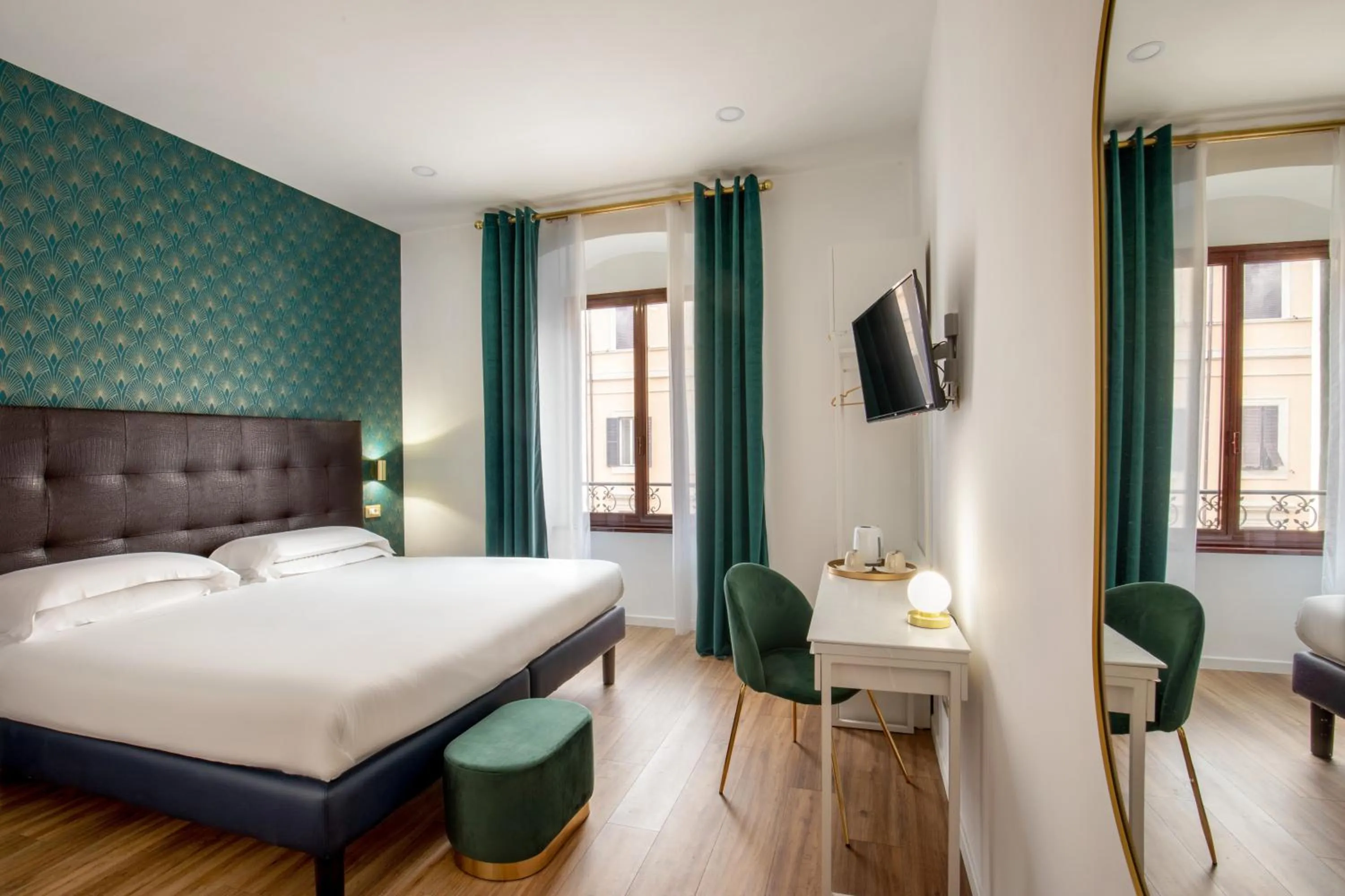 Bed in Amalia Suites by Remember Rome