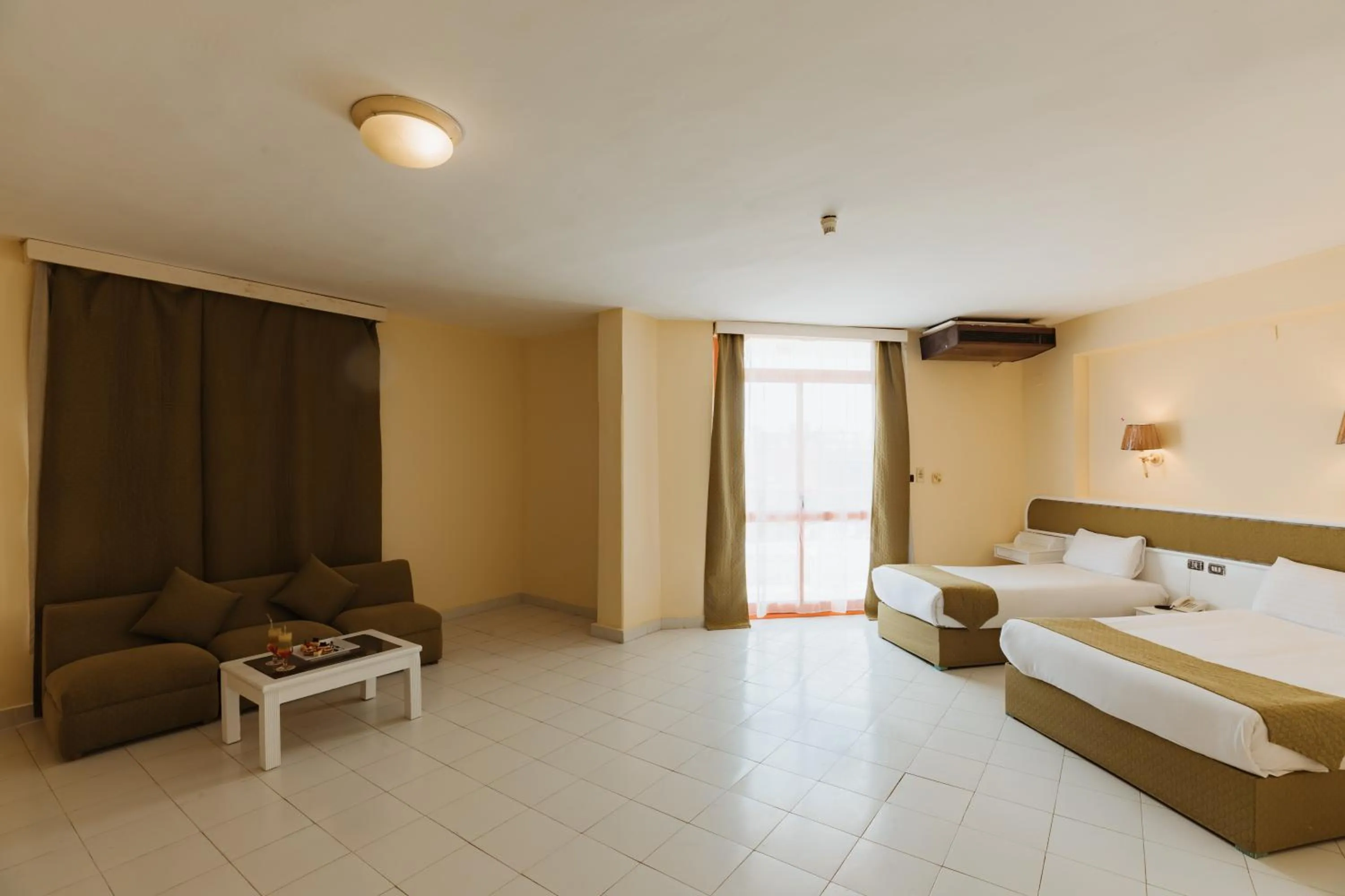 Photo of the whole room, Bed in Empire Hotel Aqua Park