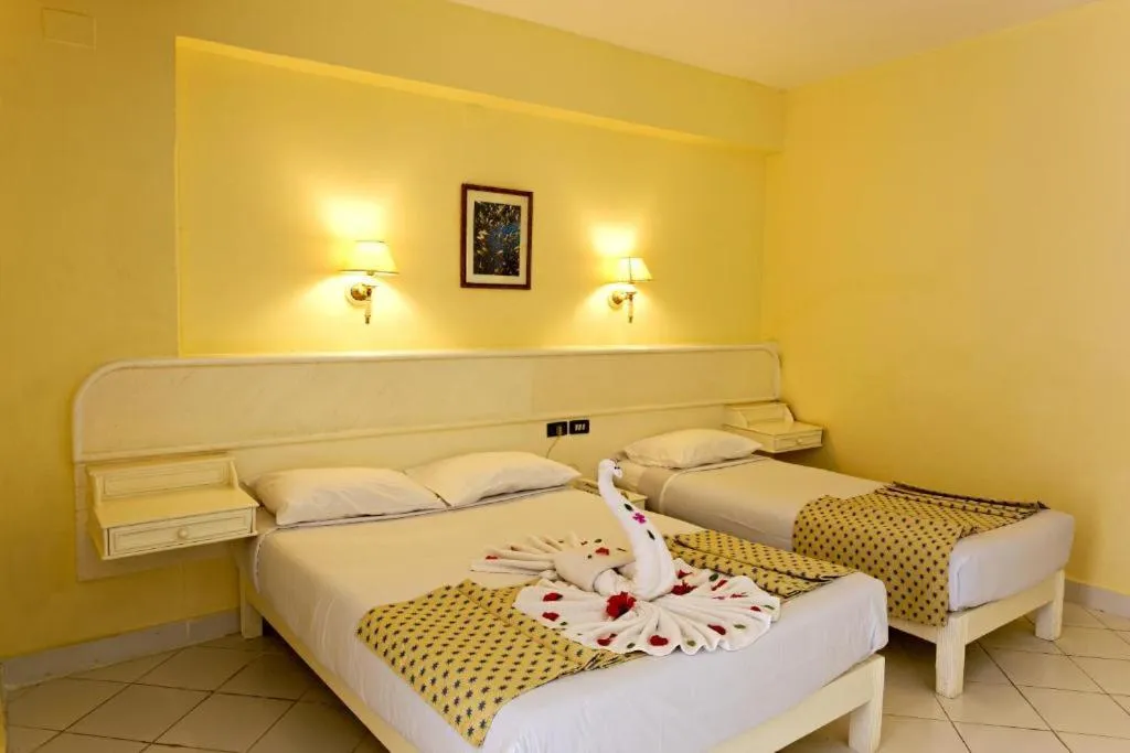 Bedroom, Bed in Empire Hotel Aqua Park