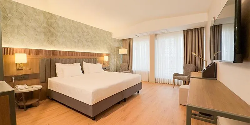 Bed in Paşapark Selçuklu Hotel