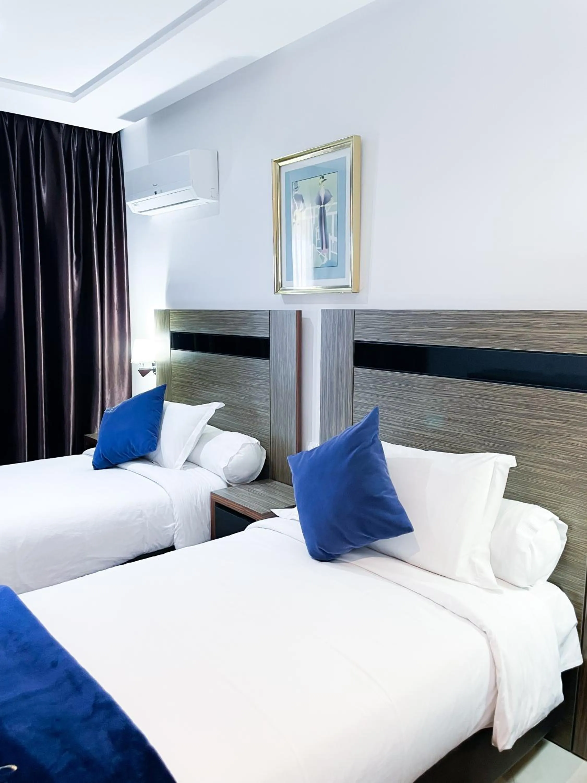 Bed in Tanger Med Hotel, Conference & Catering