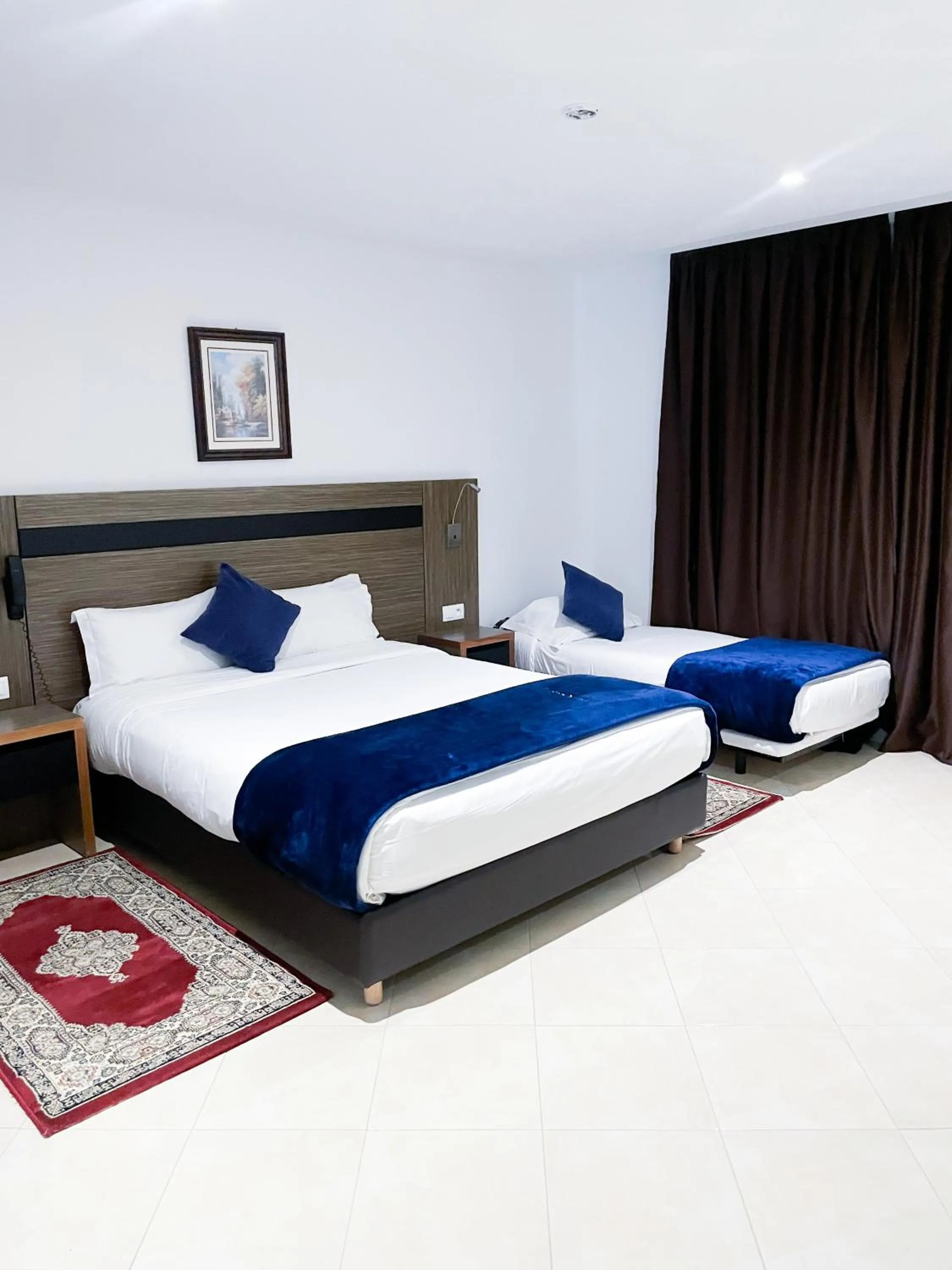 Bed in Tanger Med Hotel, Conference & Catering