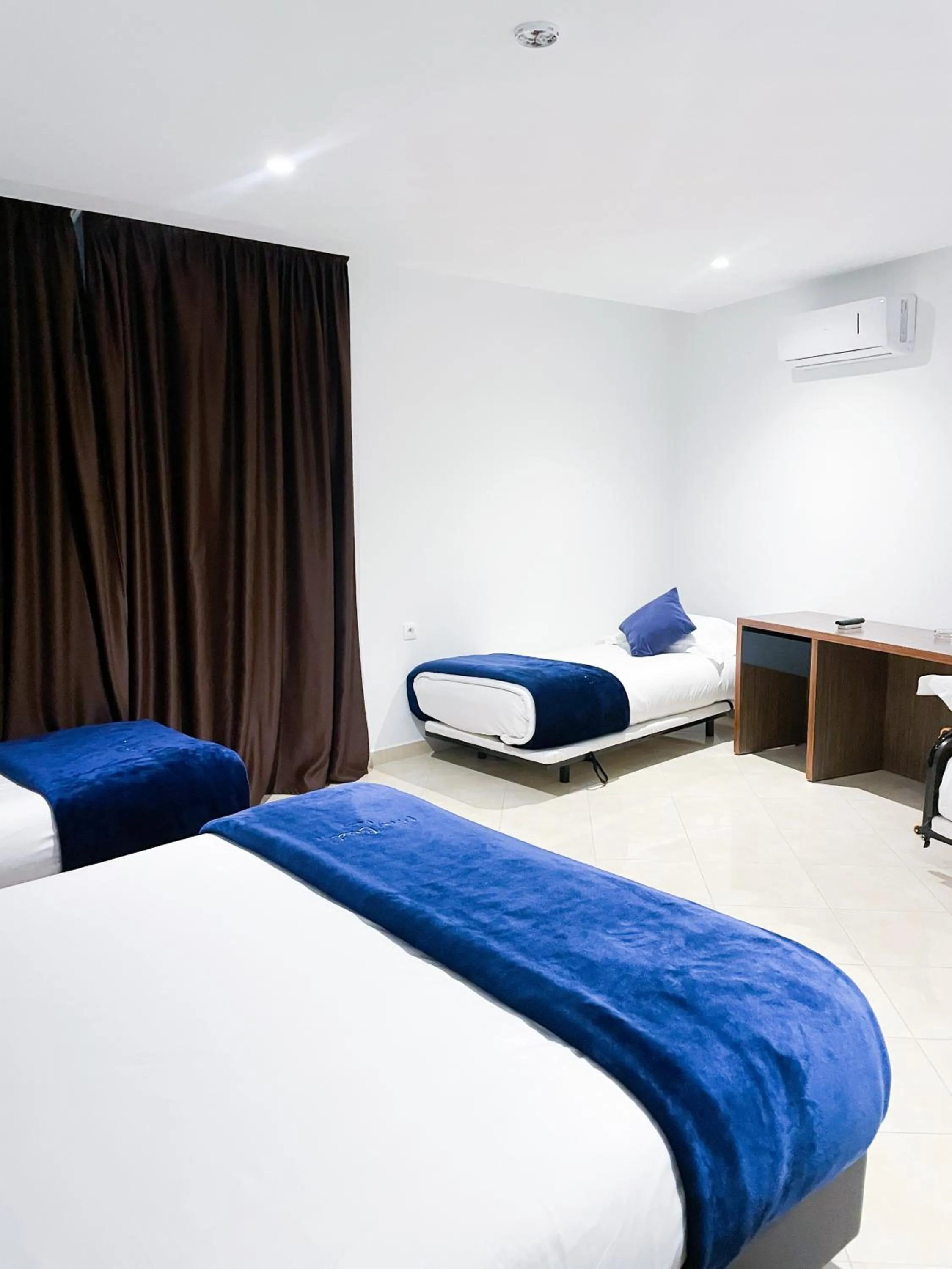 Bed in Tanger Med Hotel, Conference & Catering