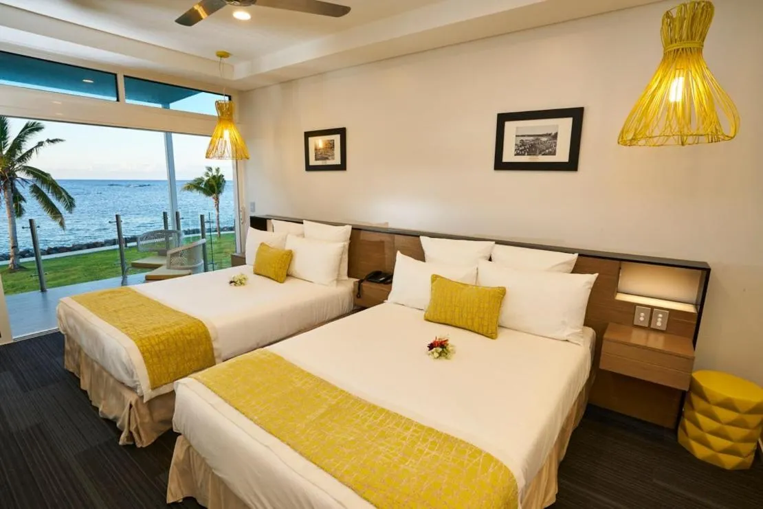 Bed in Taumeasina Island Resort