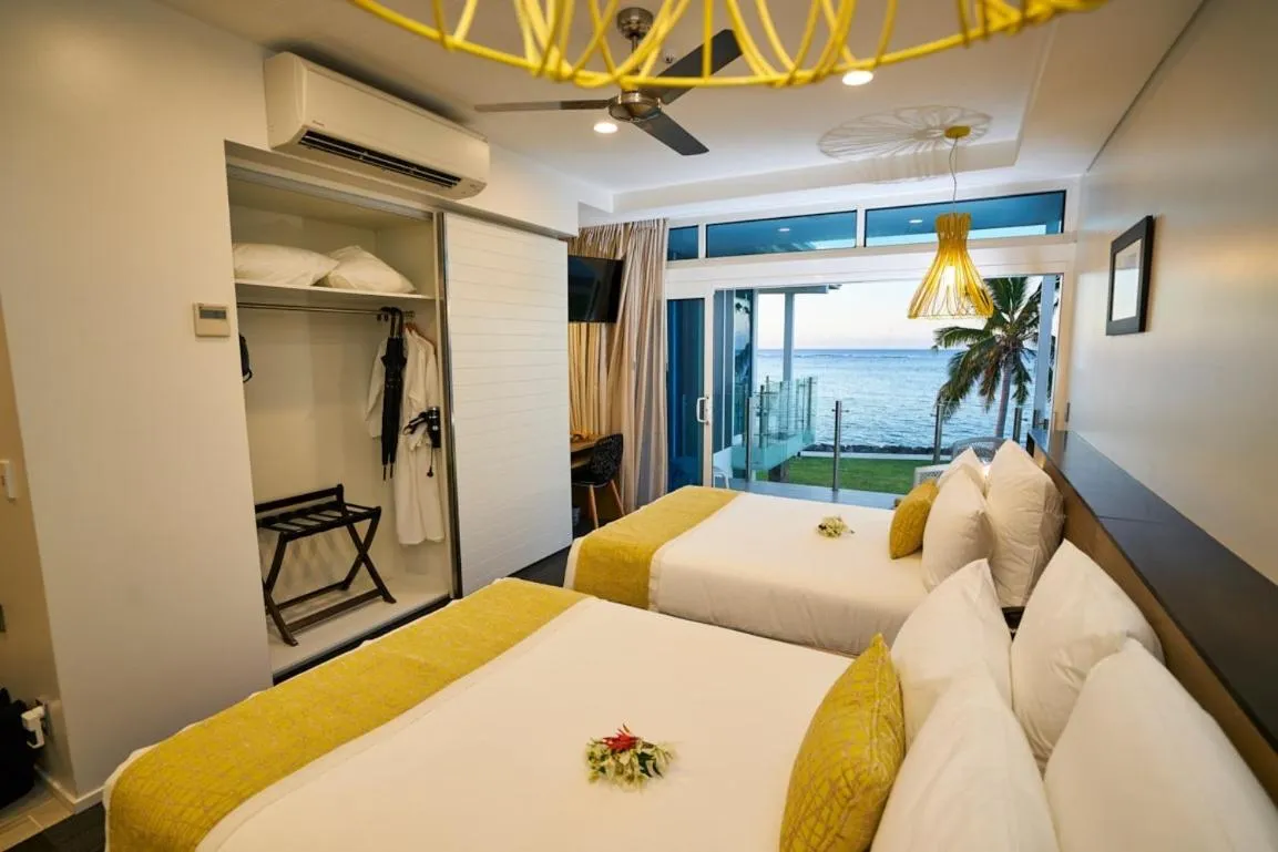 Bed in Taumeasina Island Resort