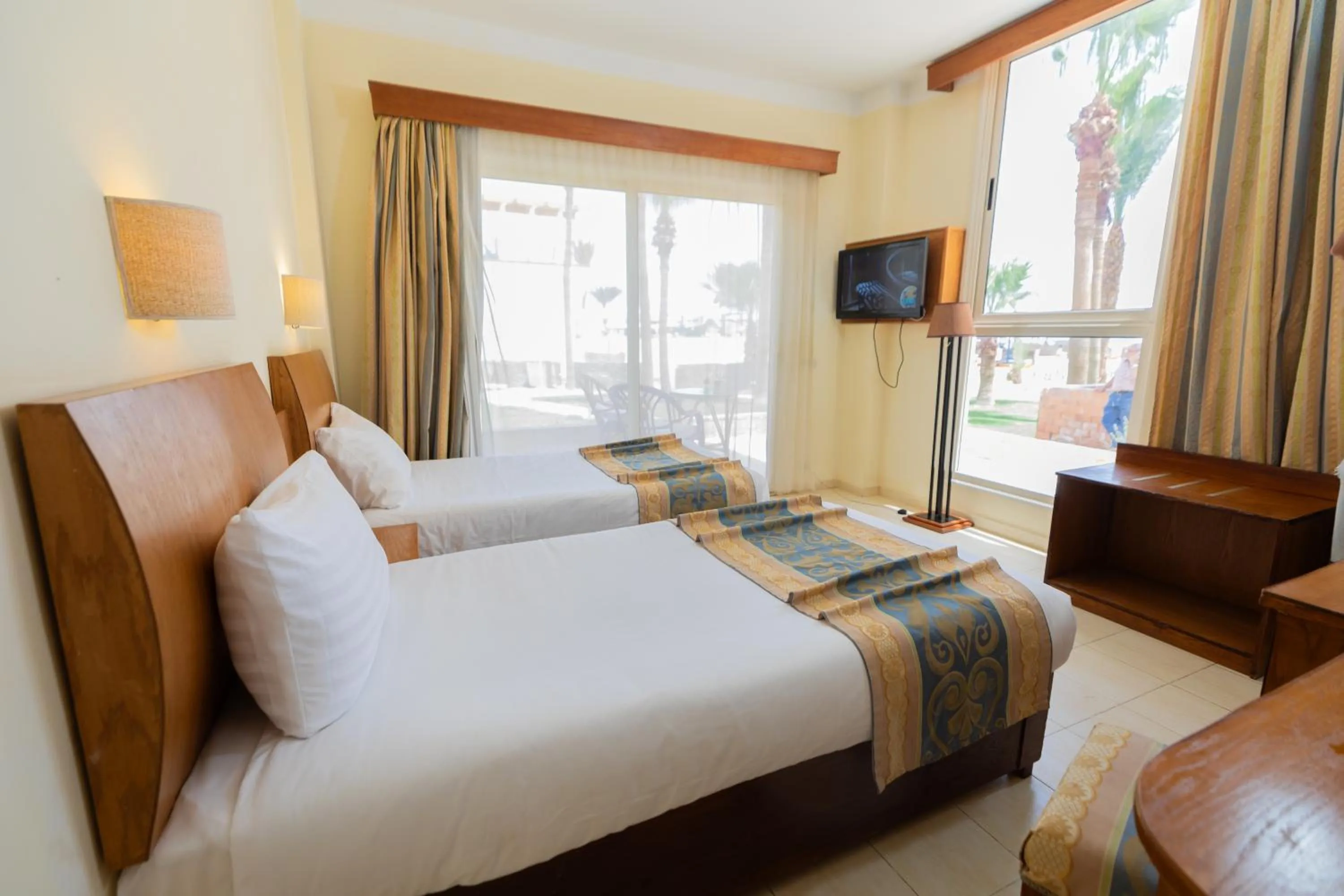 Bedroom, Bed in Empire Beach Aqua Park