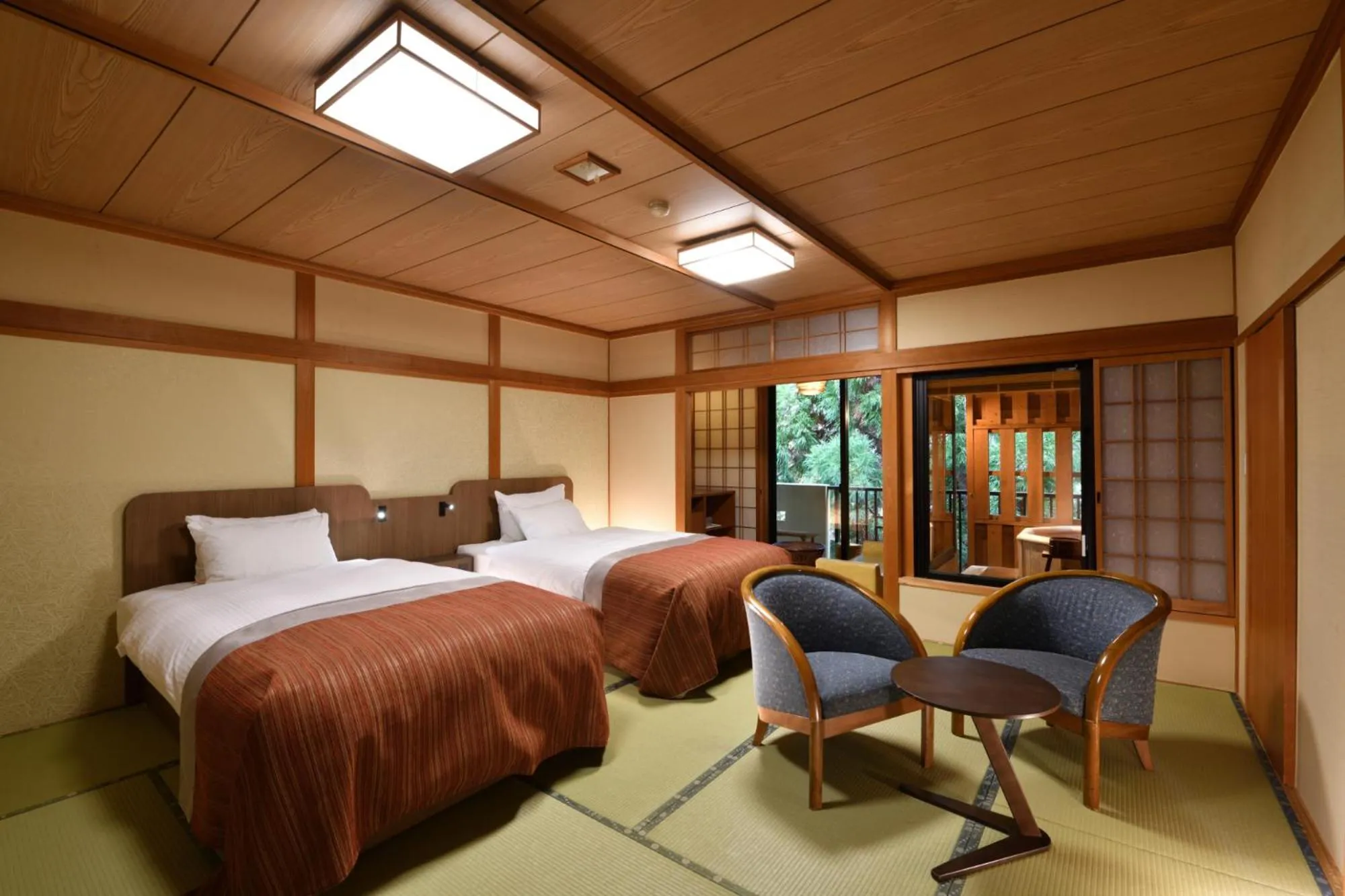 Bed in Yunogo Onsen HOTEL YUNOMORI BISYUNKAKU