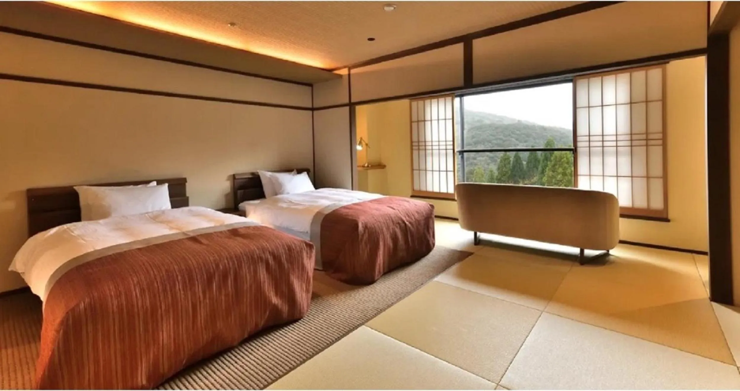 Photo of the whole room, Bed in Yunogo Onsen HOTEL YUNOMORI BISYUNKAKU