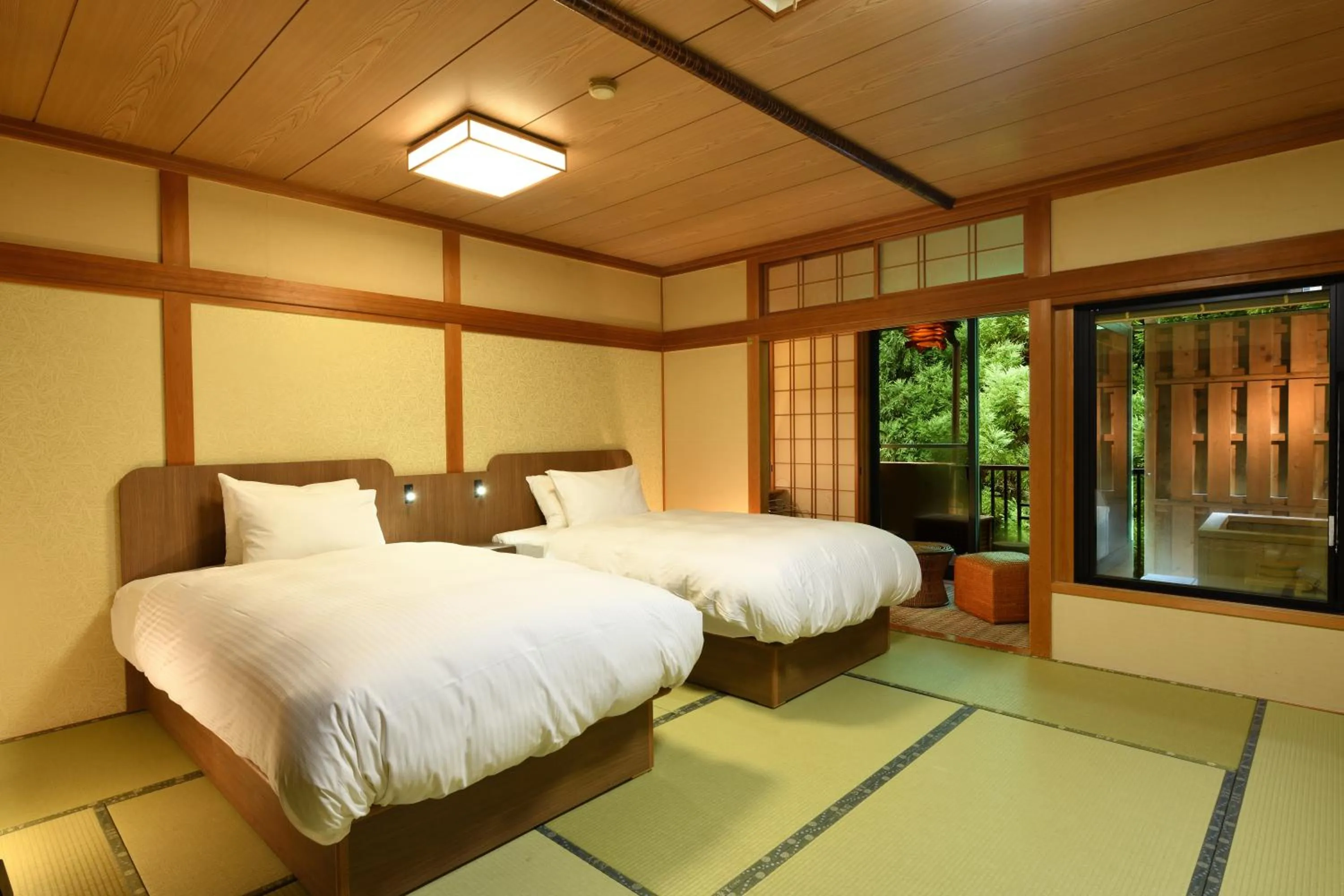 Photo of the whole room, Bed in Yunogo Onsen HOTEL YUNOMORI BISYUNKAKU