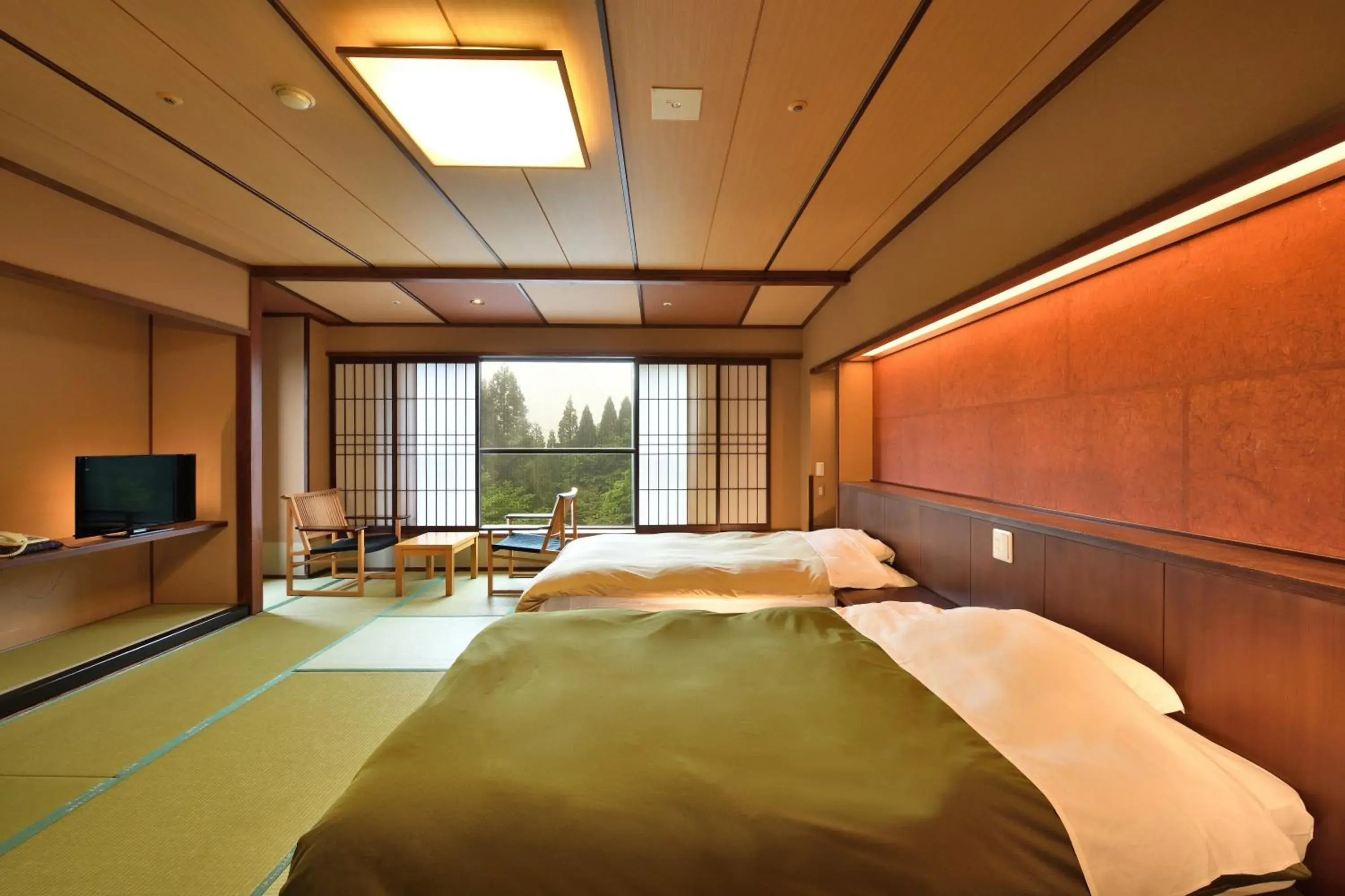 Photo of the whole room, Bed in Yunogo Onsen HOTEL YUNOMORI BISYUNKAKU Photo of the whole room, Bed in Yunogo Onsen HOTEL YUNOMORI BISYUNKAKU