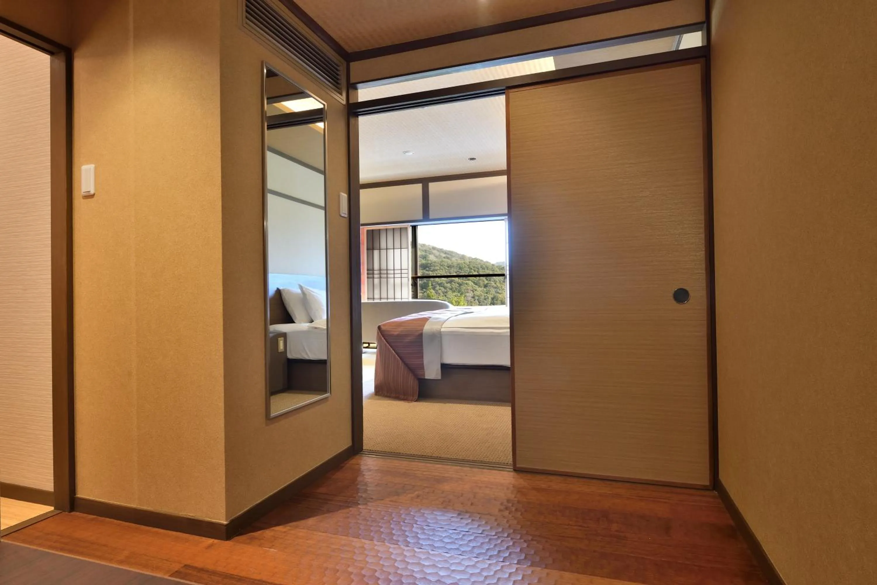 Photo of the whole room, Bed in Yunogo Onsen HOTEL YUNOMORI BISYUNKAKU