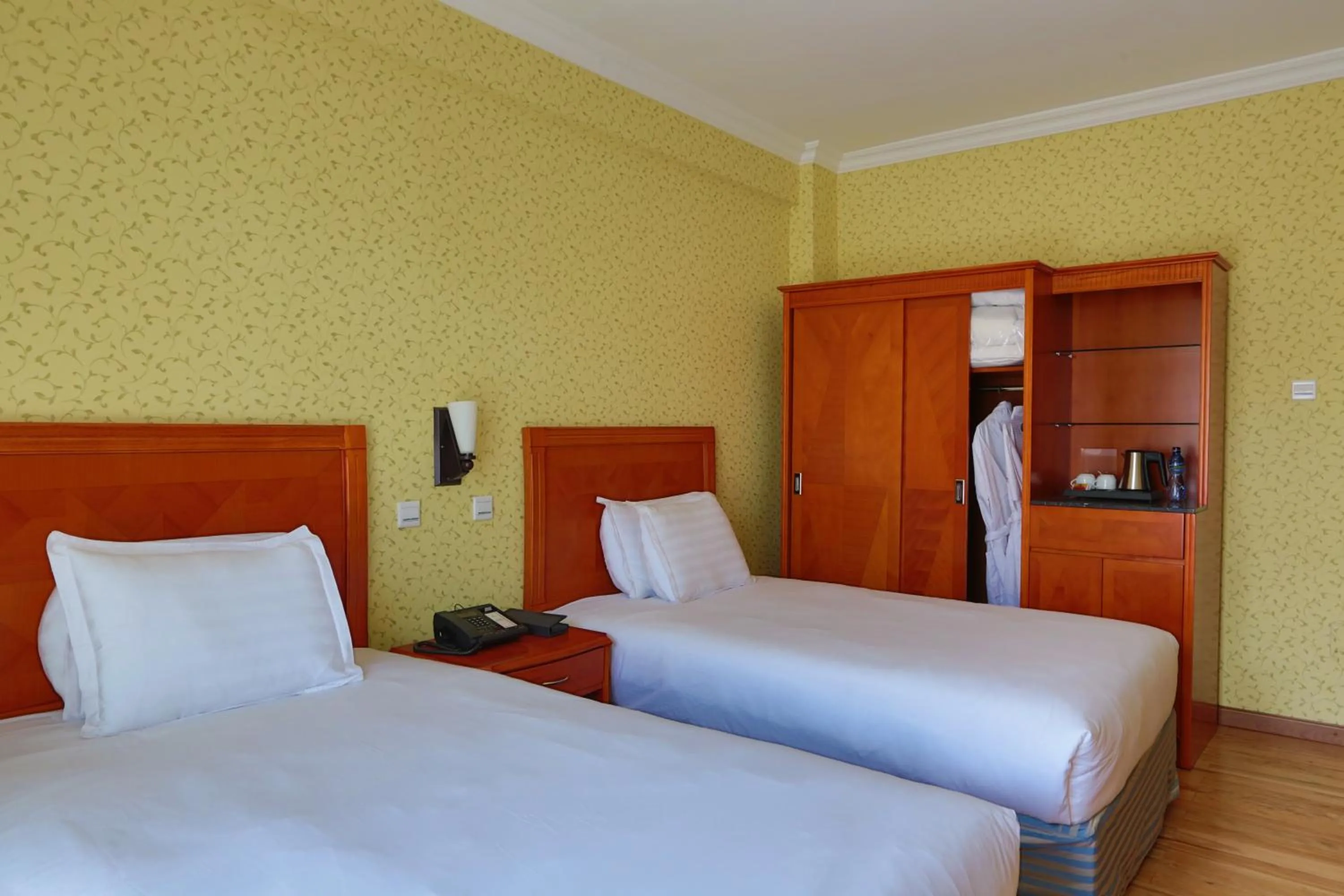 Bed in Abyssinia Renaissance Hotel