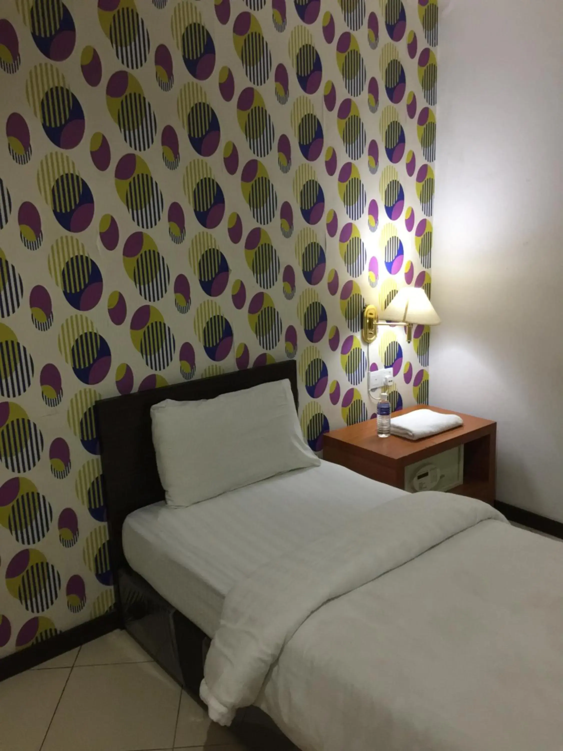 Bed in Permai Hotel Bed in Permai Hotel