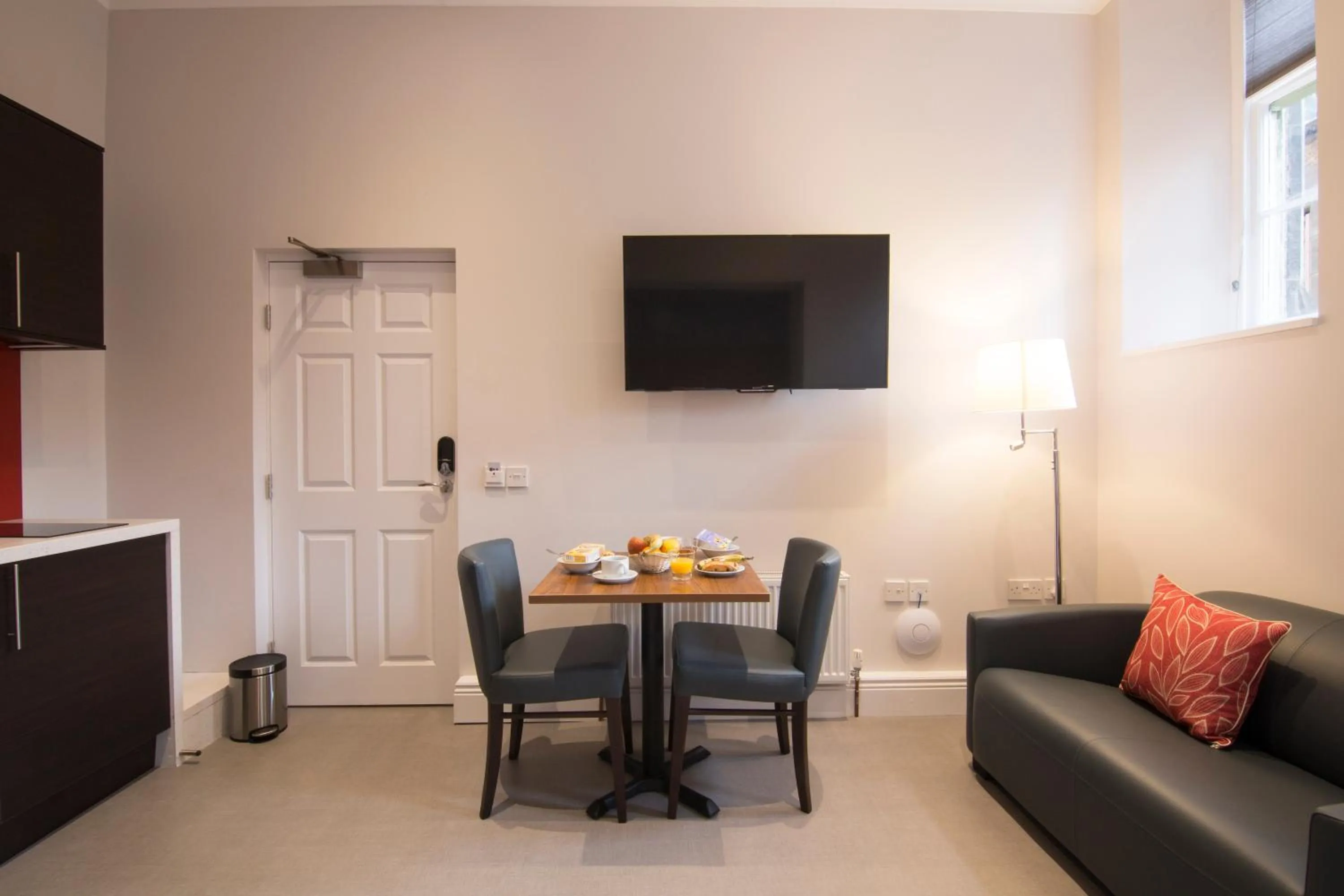 Seating area in Court Residence Aparthotel