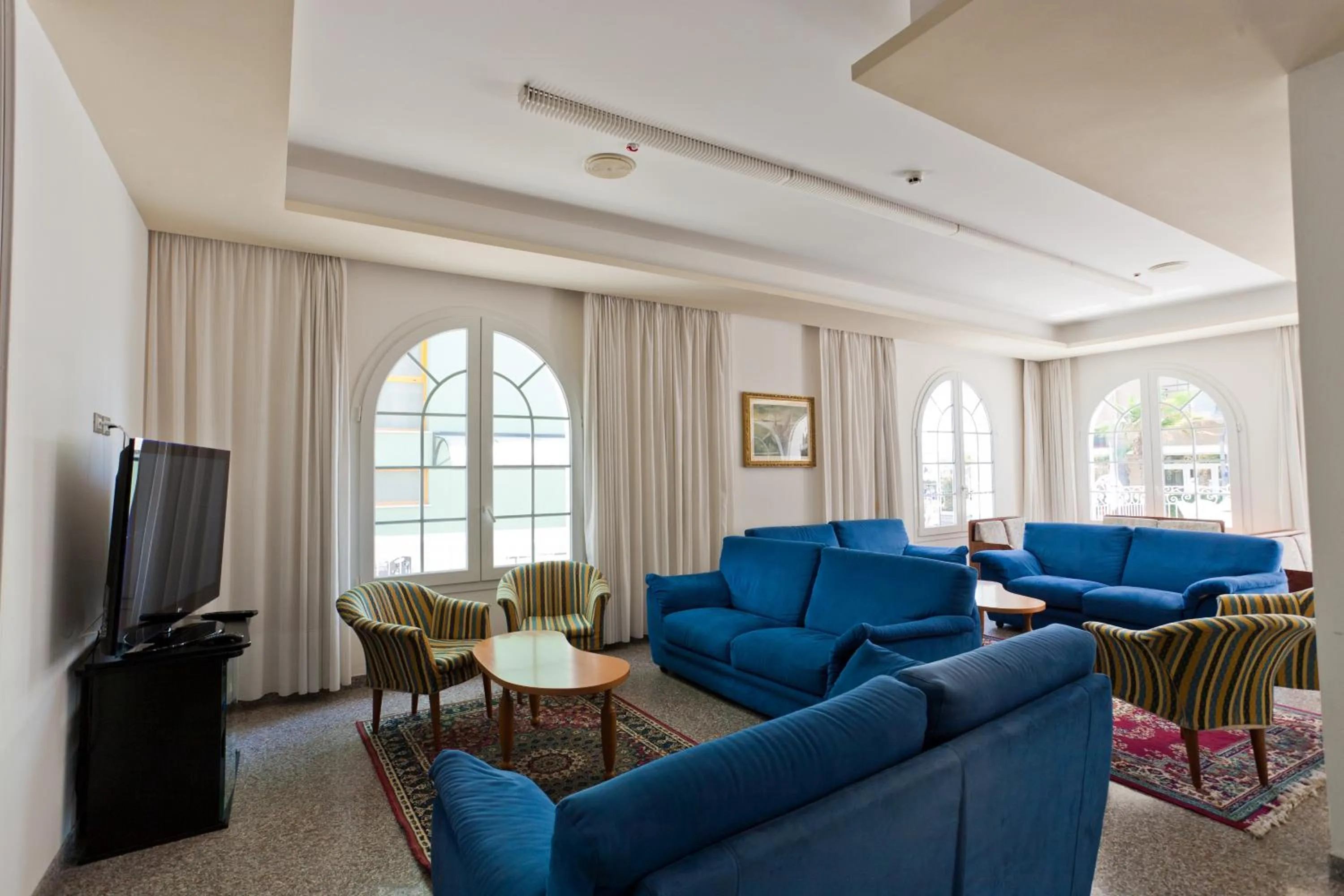 Communal lounge/ TV room in Hotel Rosa Maria Elite