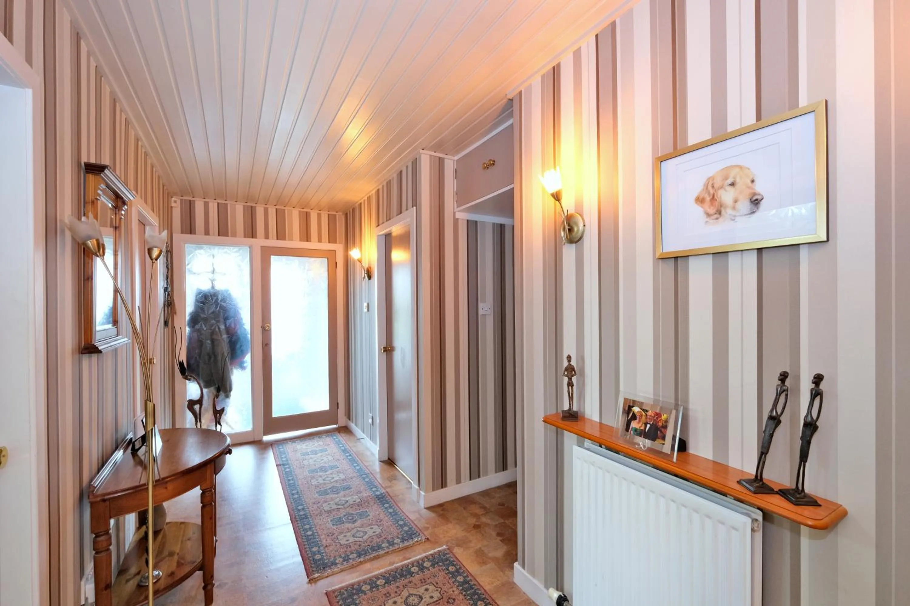 Communal lounge/ TV room in The Jays Guest House