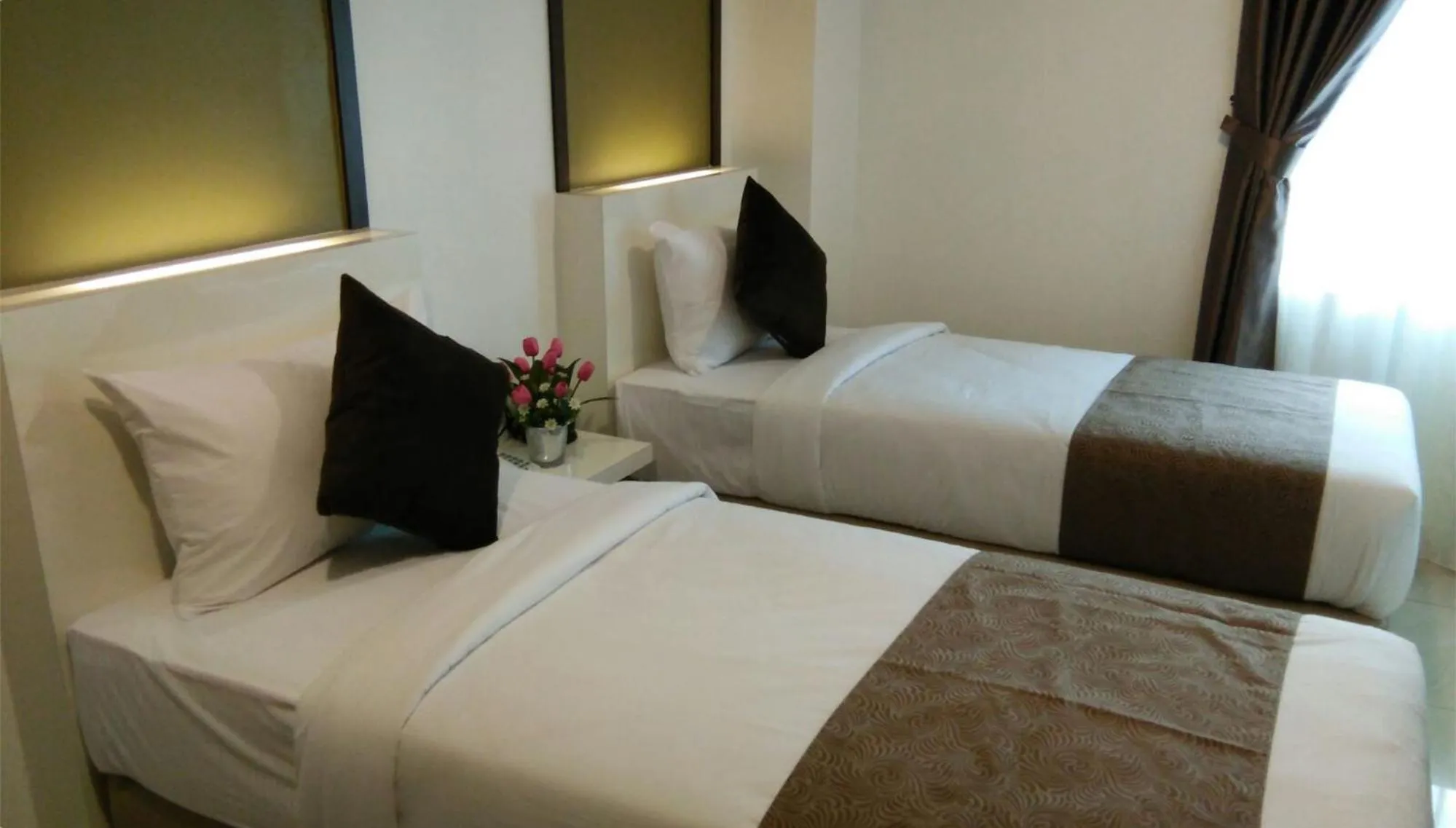 Bedroom in Crescendo Boutique Hotel