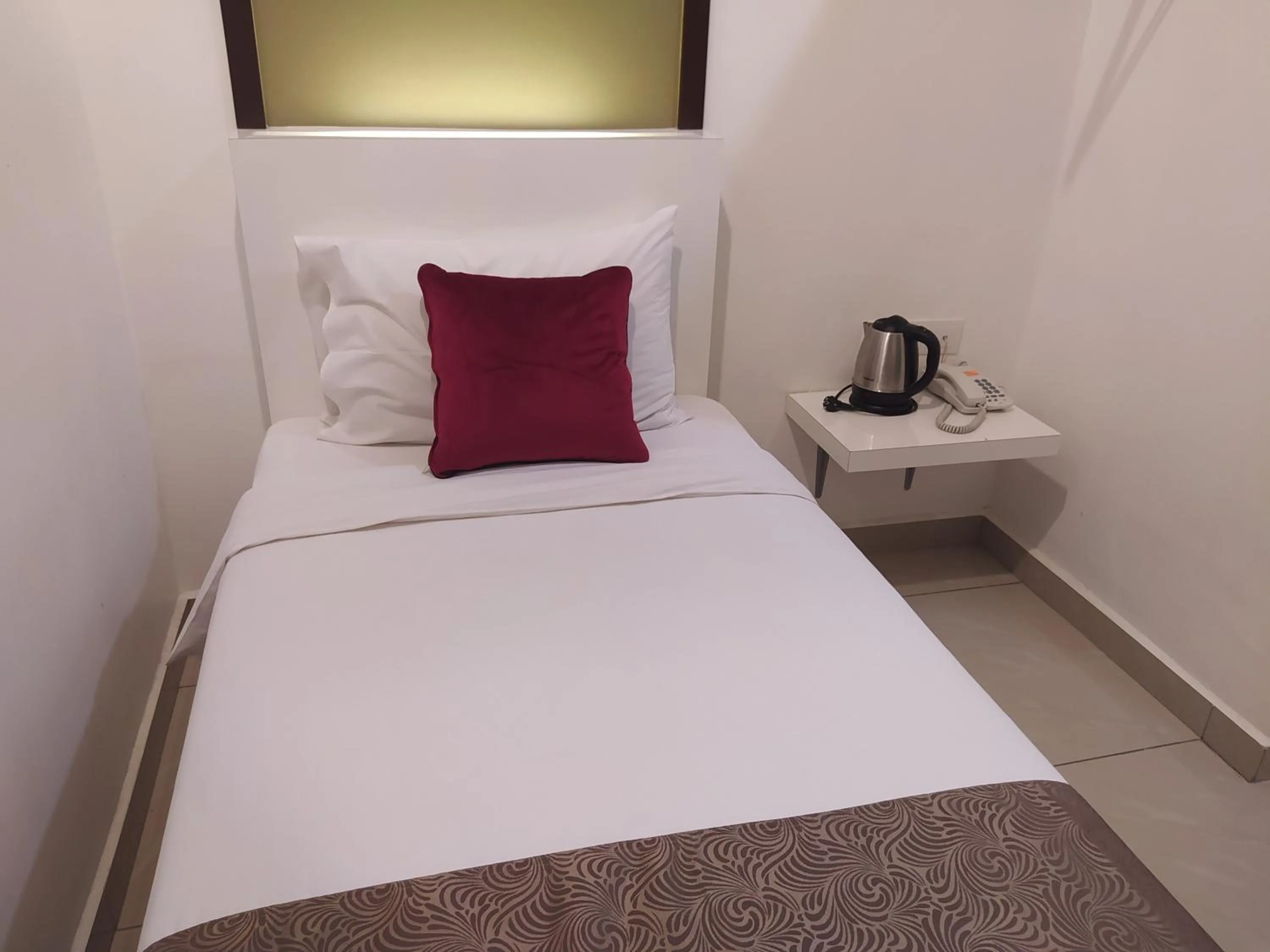 Bedroom in Crescendo Boutique Hotel