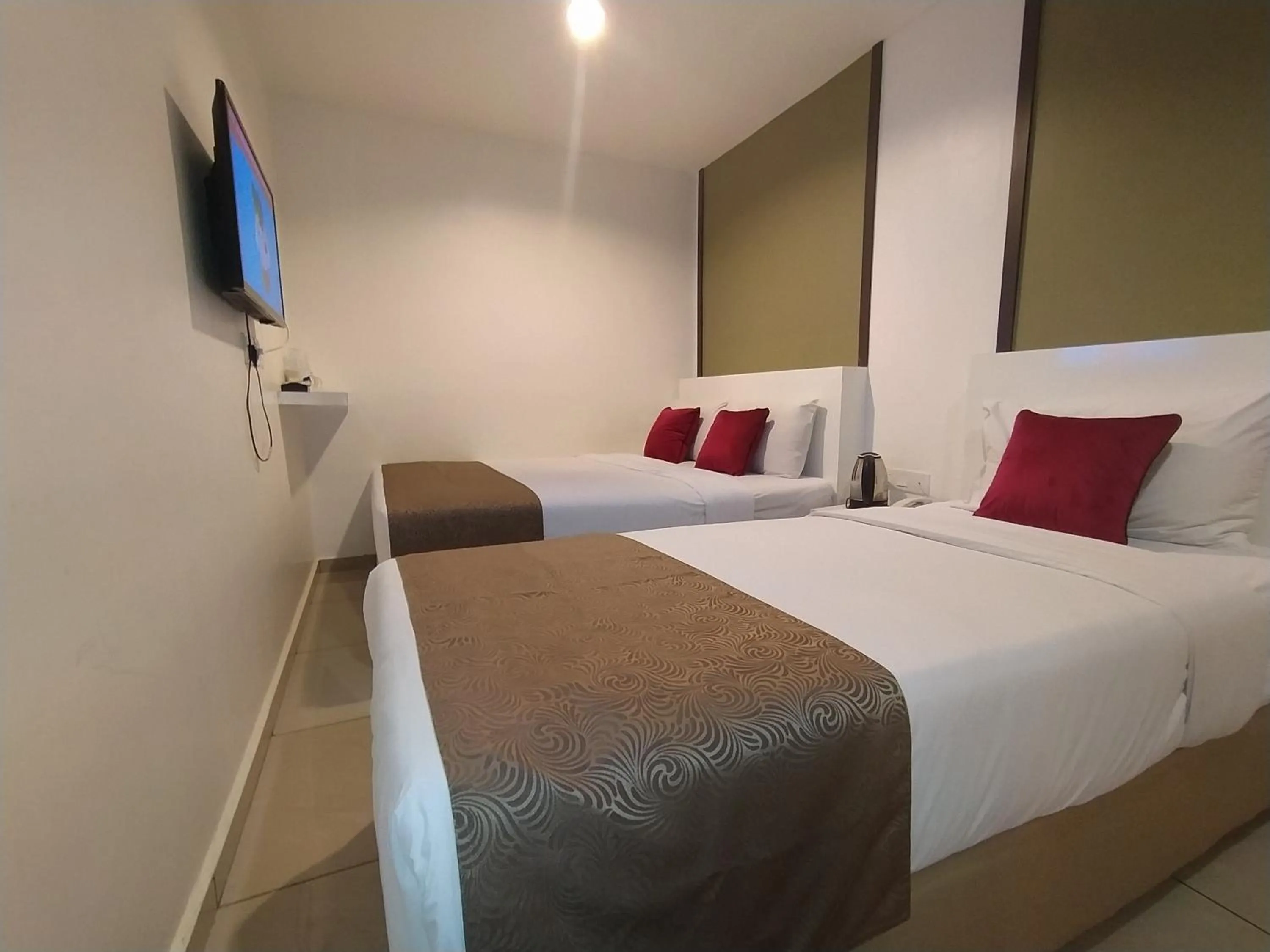 Bedroom in Crescendo Boutique Hotel