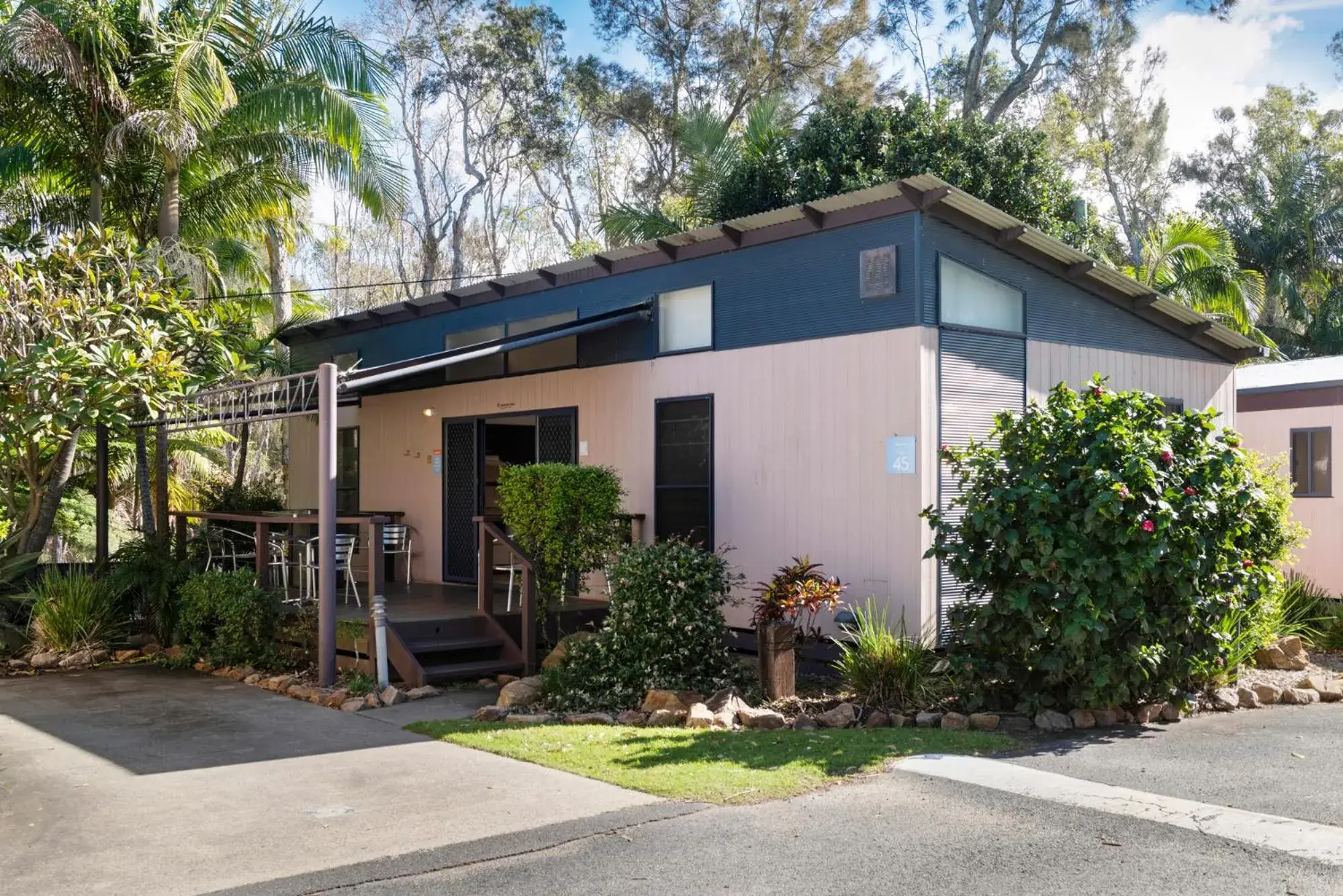 Deluxe 2 Bedroom Cabin - Sleeps 6 (1 Queen, 2 Bunks) in Discovery Parks - Emerald Beach Deluxe 2 Bedroom Cabin - Sleeps 6 (1 Queen, 2 Bunks) in Discovery Parks - Emerald Beach