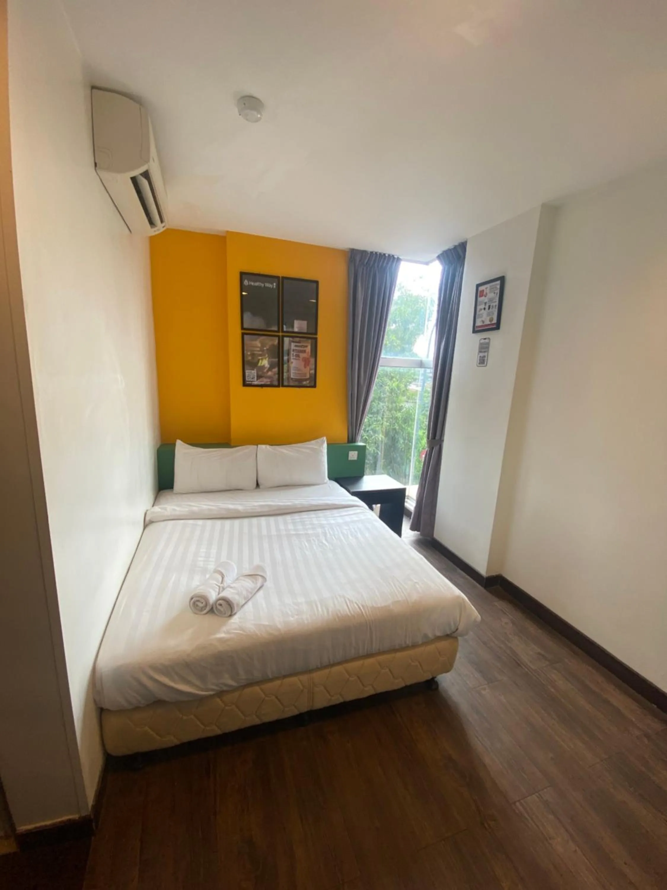 Bedroom, Bed in Timez Business Hotel