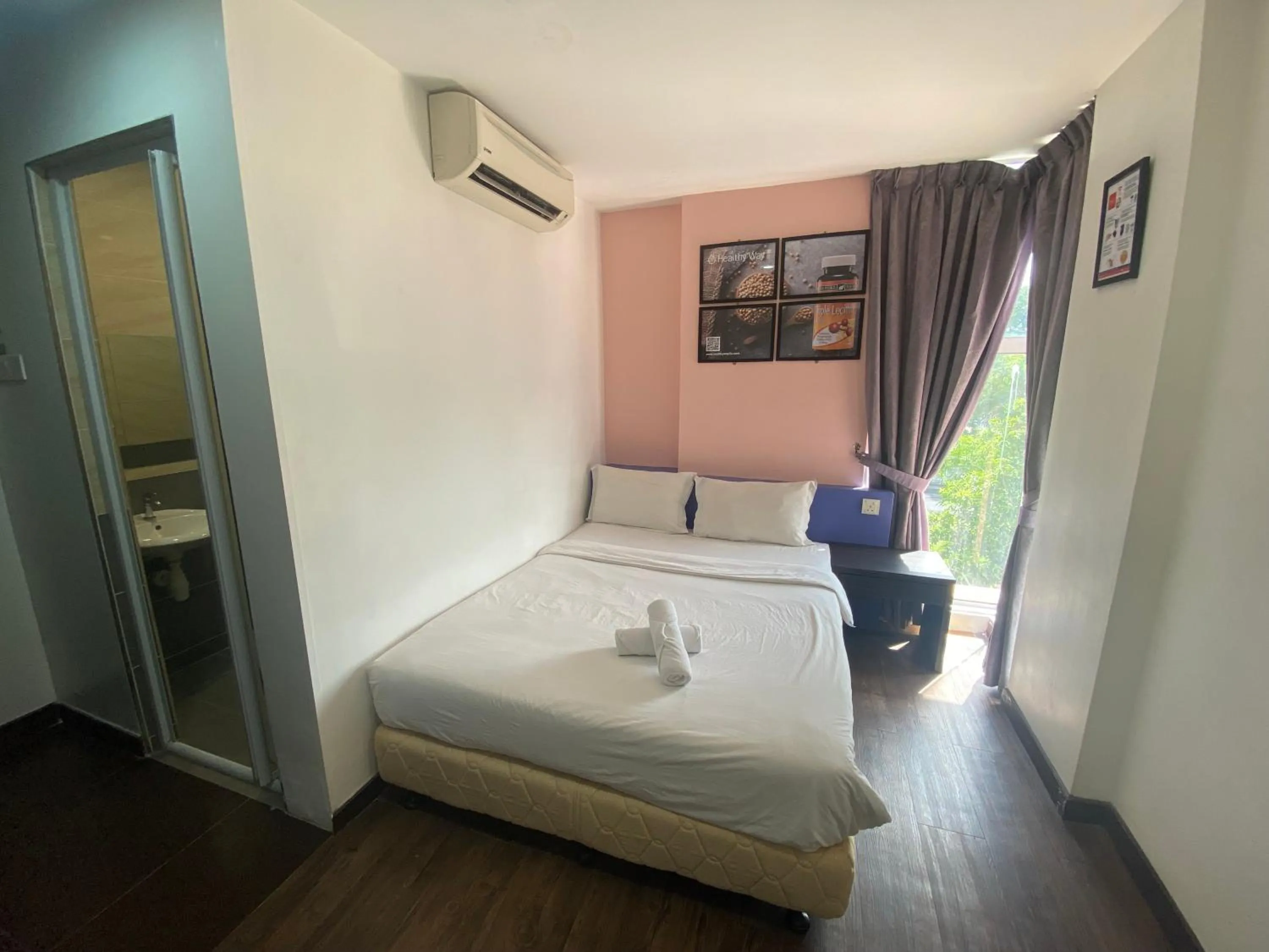 Bedroom, Bed in Timez Business Hotel