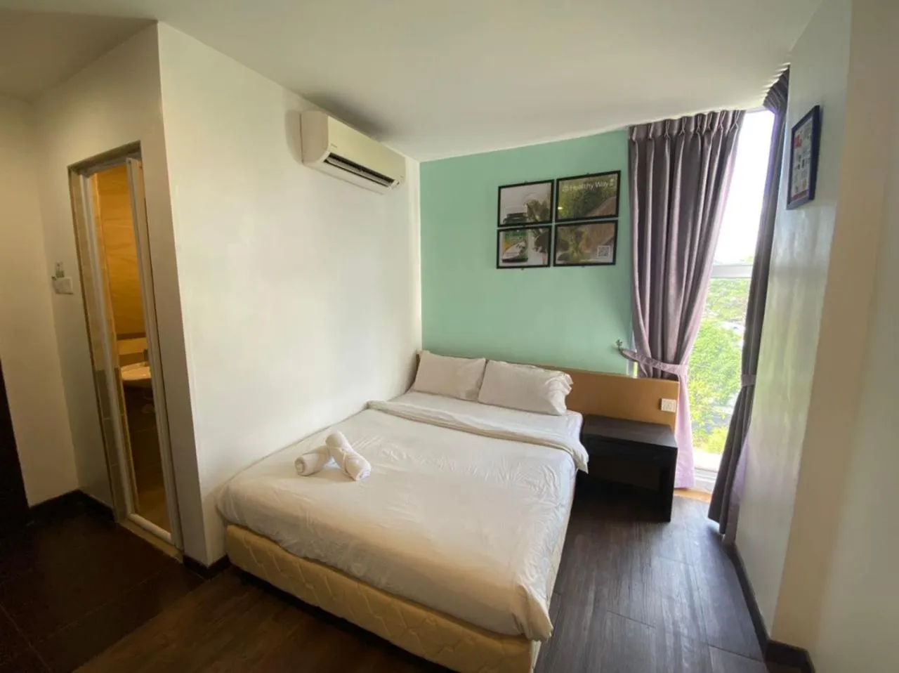 Bedroom, Bed in Timez Business Hotel