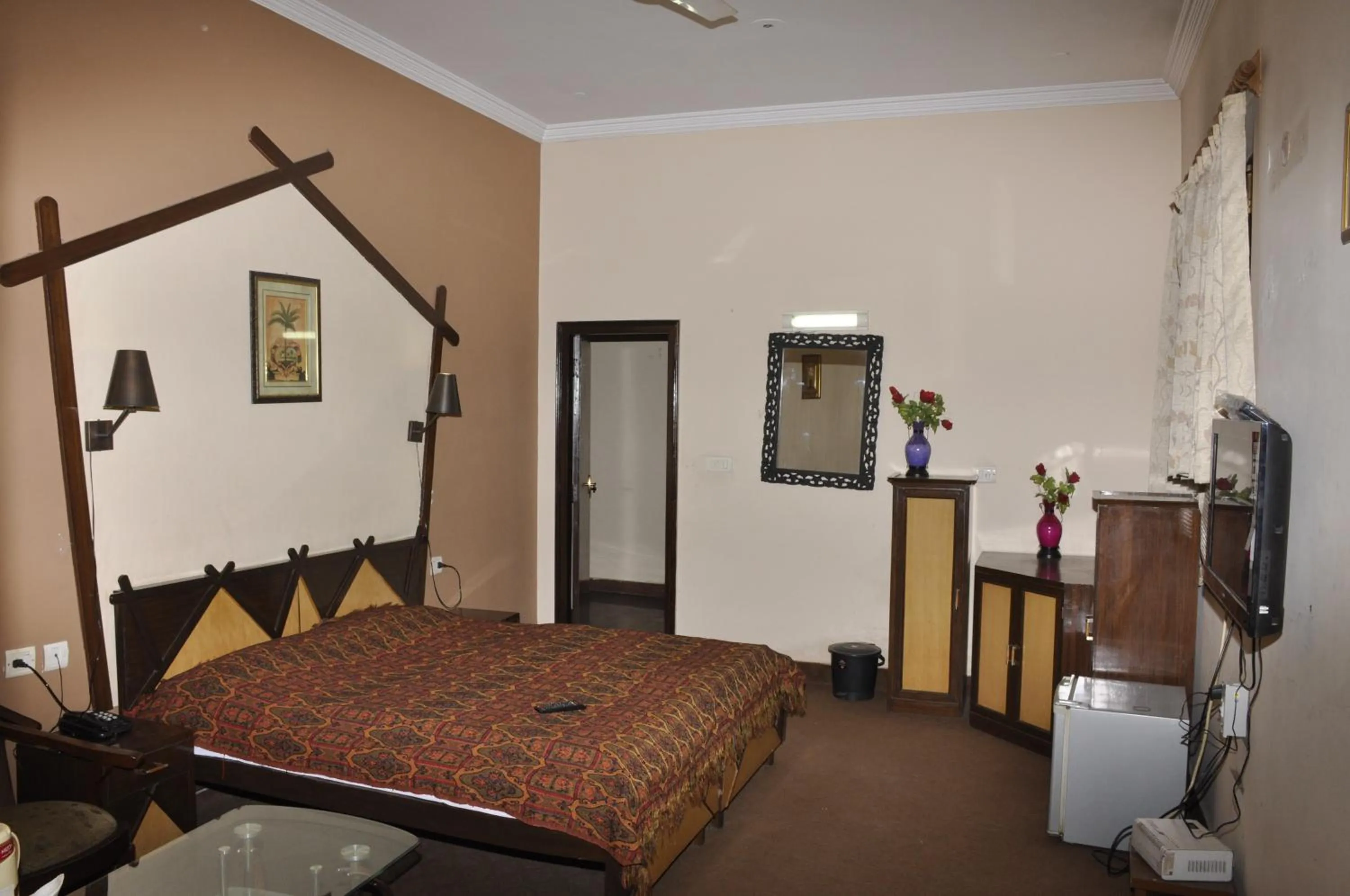 Bed in Hotel Pratiksha