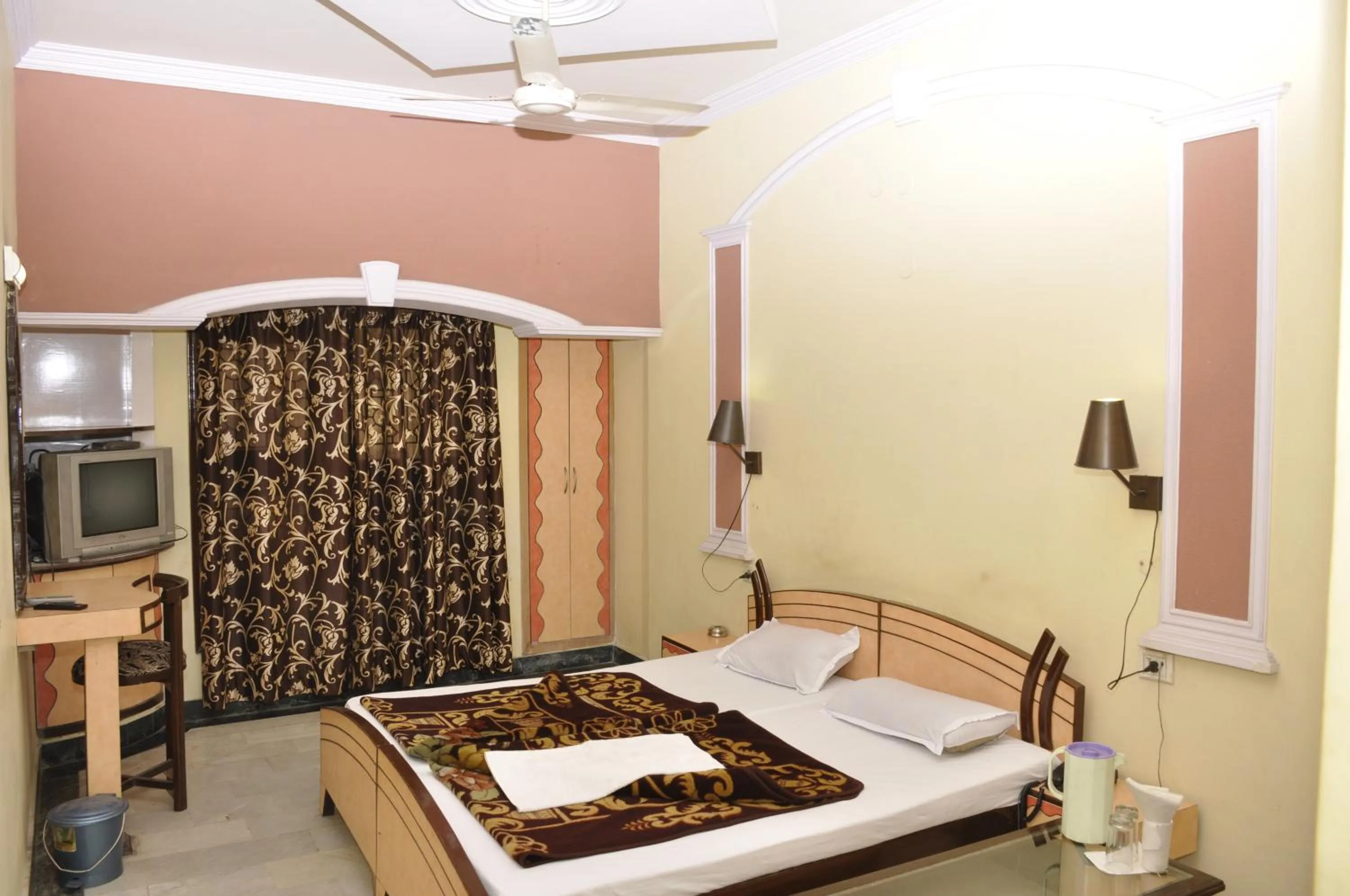 Bed in Hotel Pratiksha