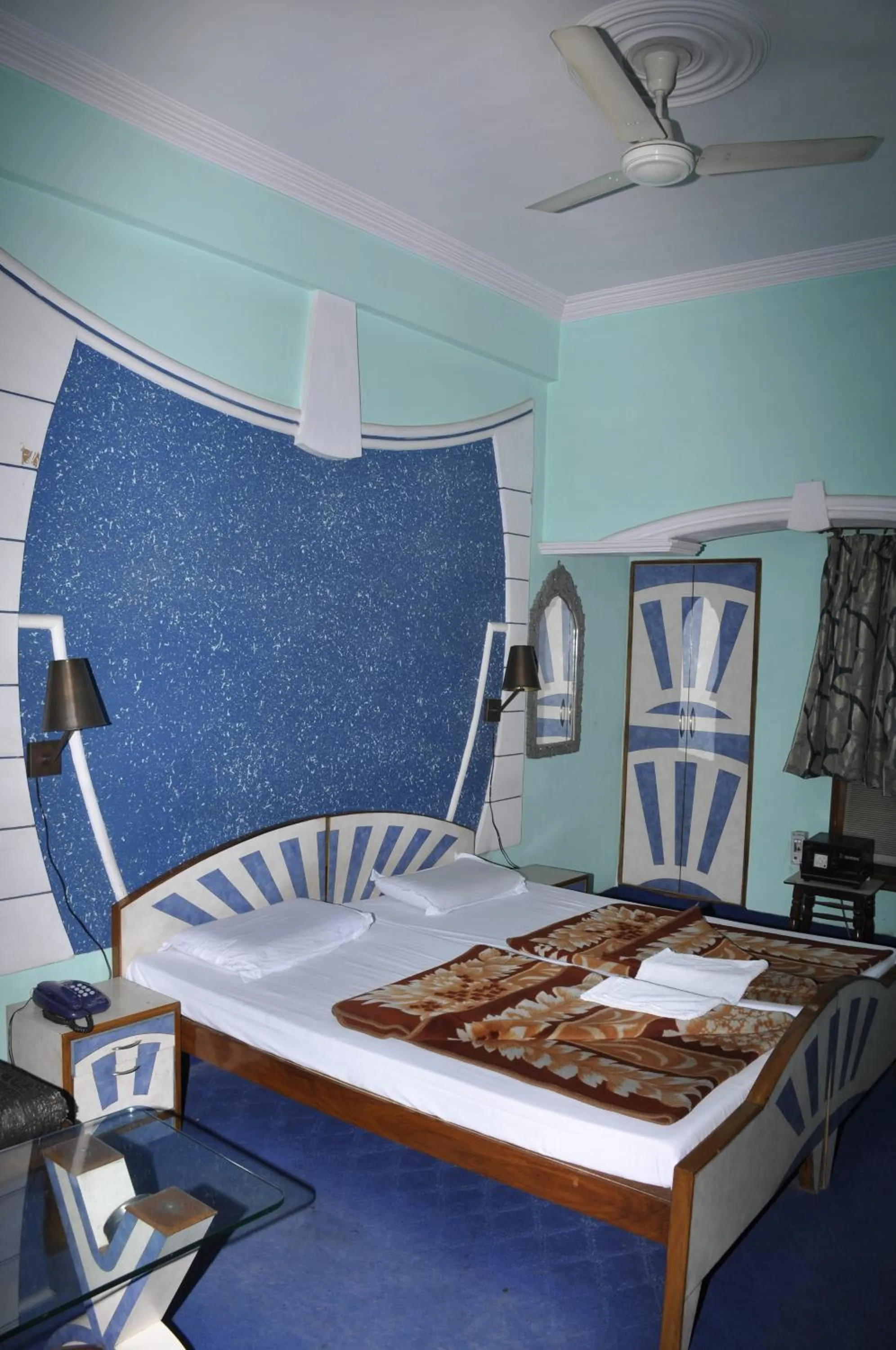 Bed in Hotel Pratiksha